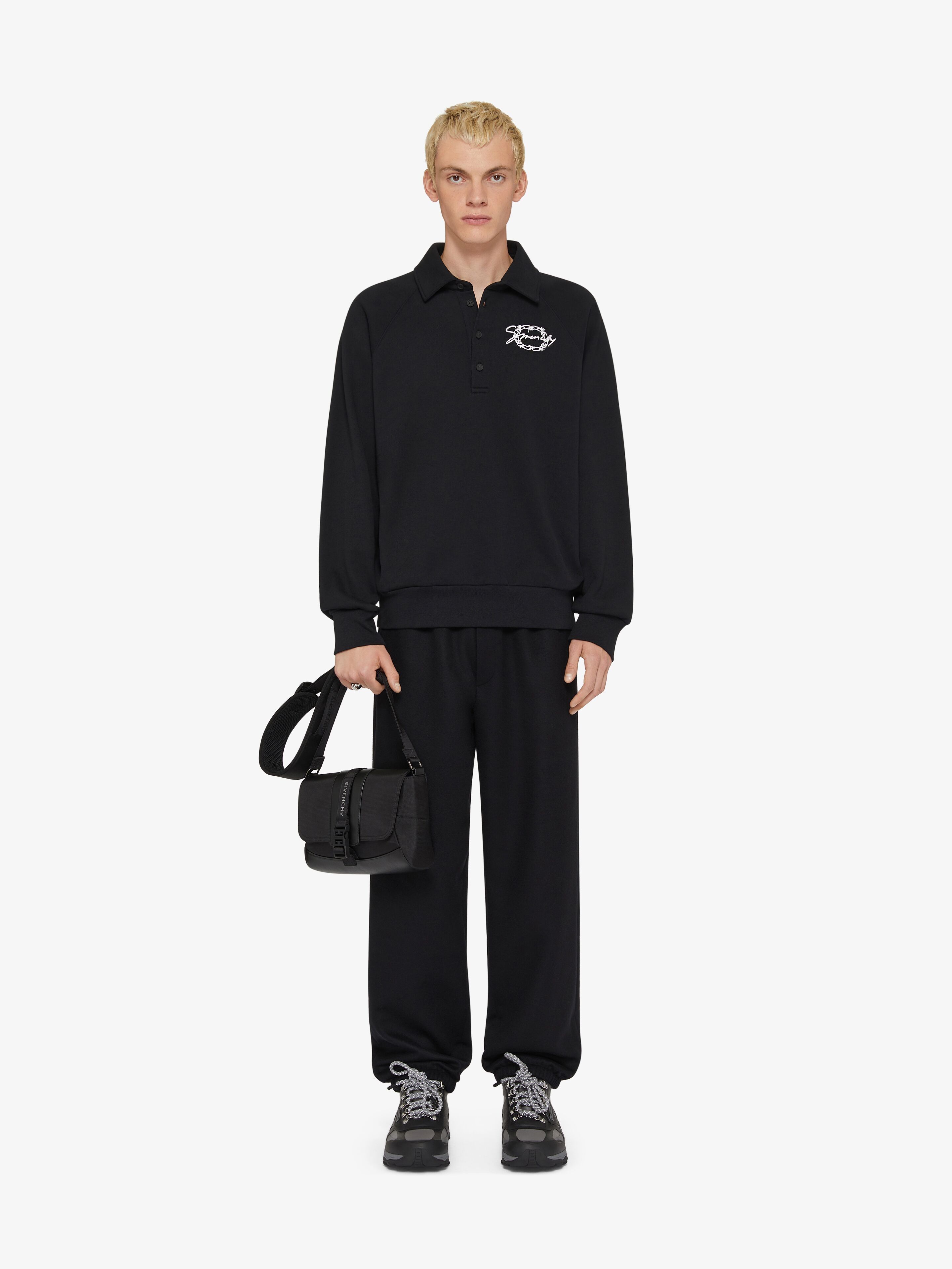 o1w1db10925 Buttoned Raglan Long Sleeve Sweatshirt in Black