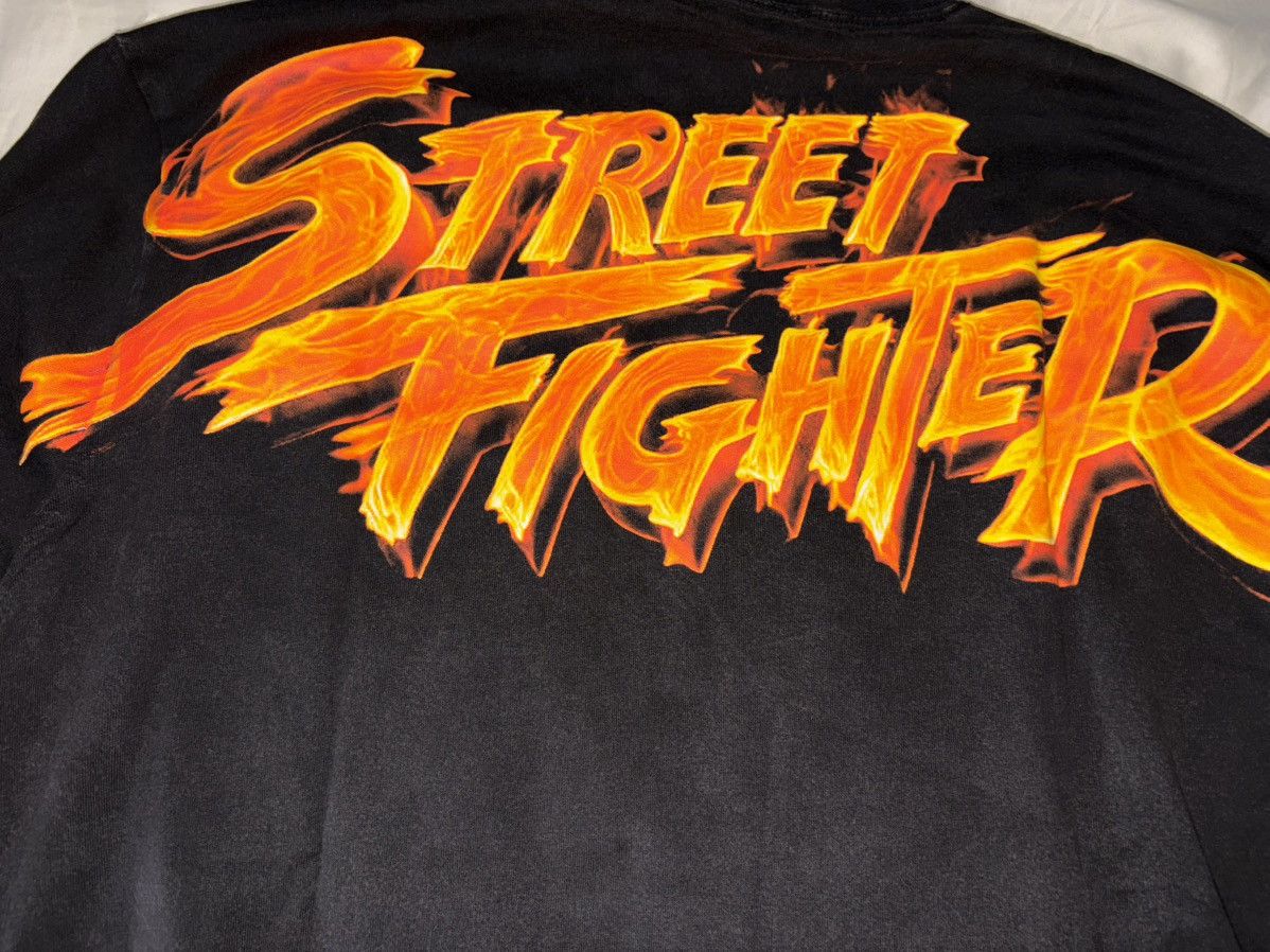 Kith × Marvel Comics KITH CAPCOM SF FLAME VINTAGE JONES L/S TEE - BLACK Size US L / EU 52-54 / 3 - 2 Thumbnail