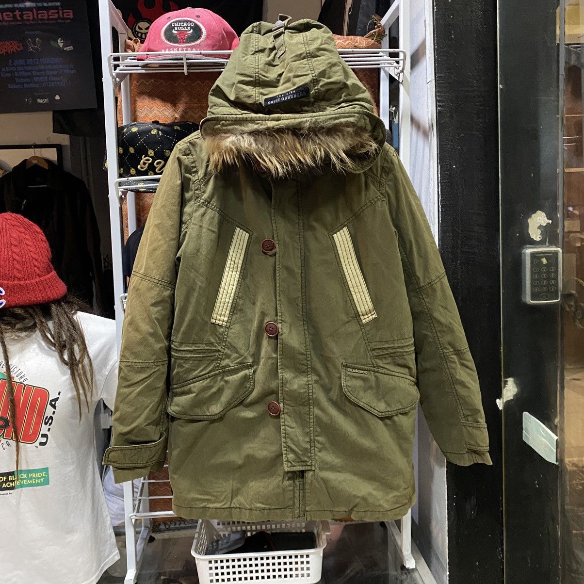 Buckaroo olive green parka jacket with a faux-fur trim hood