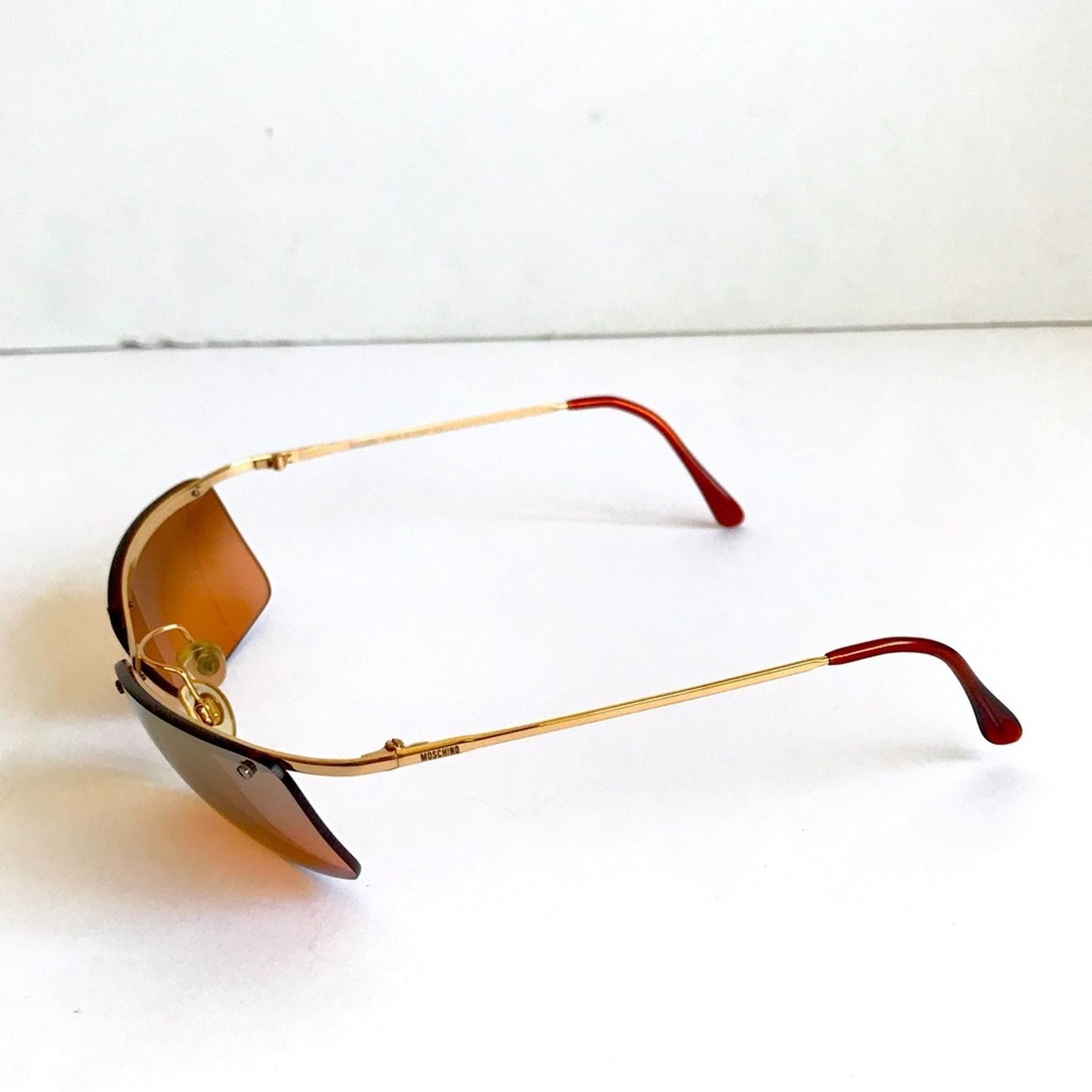 Moschino MOSCHINO 1990's Rimless Iridescent ROSE GOLD Sunglasses Size ONE SIZE - 6 Thumbnail