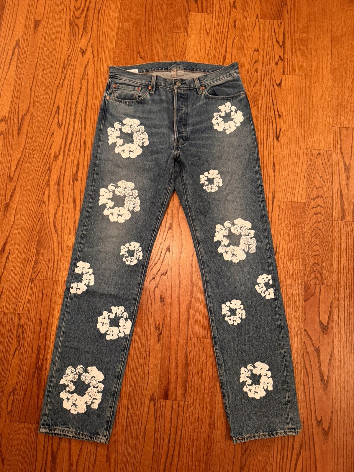 **DENIM TEARS x LEVI LIGHT WASH BLUE JEANS
