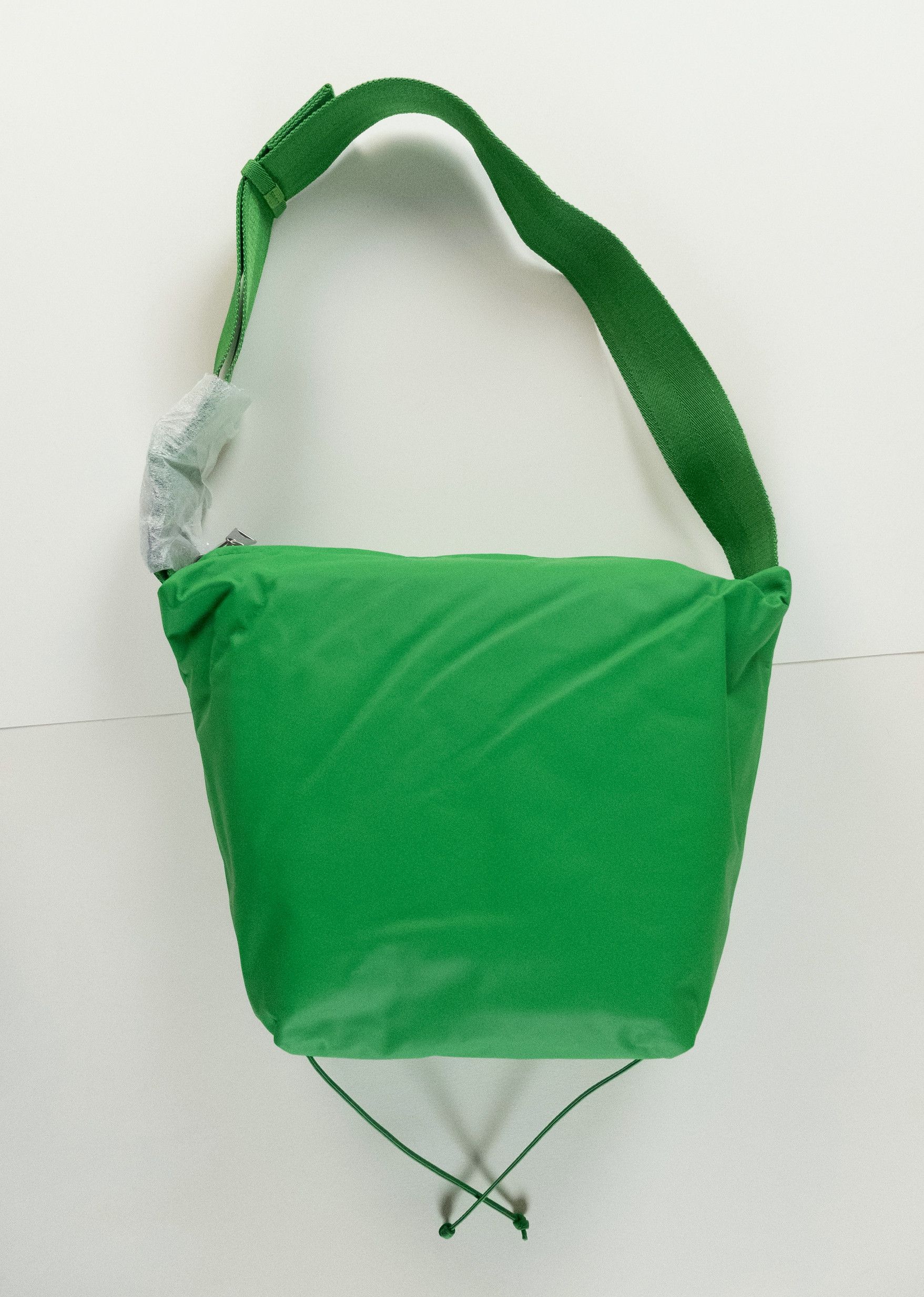 Bottega Veneta Solid Parakeet Green Leather Sling Bag, Men's