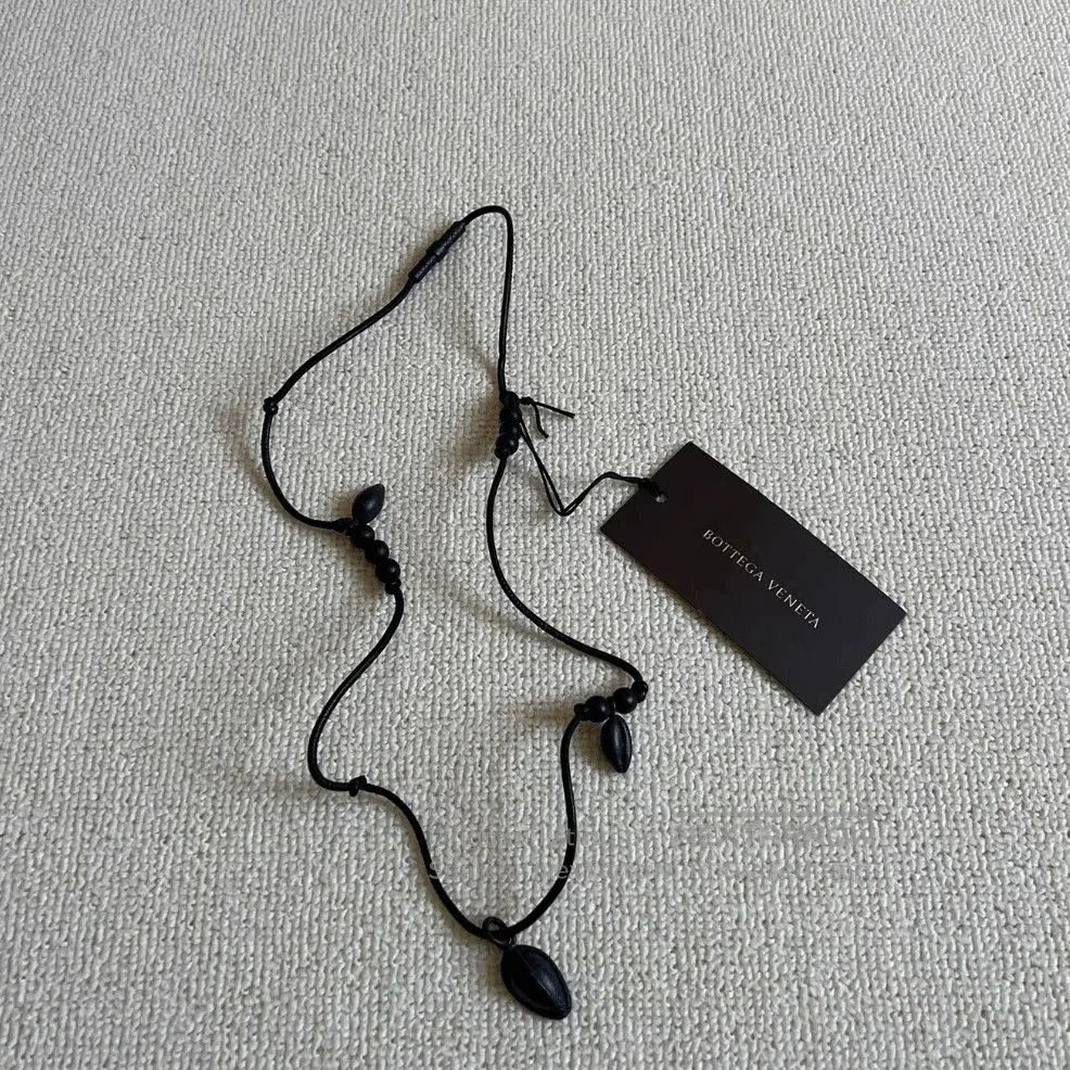 Bottega Veneta Coffee Bean Necklace.