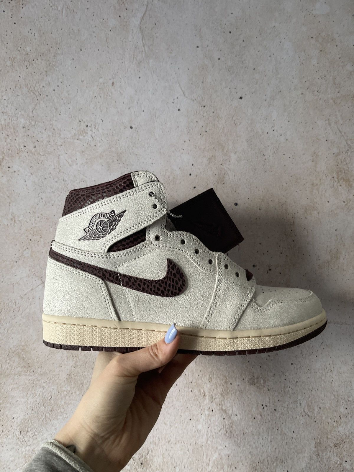 image of Jordan Brand 1 Retro High OG A Ma Maniére Shoes in Sail/Burgundy Crush, Men's (Size 9)