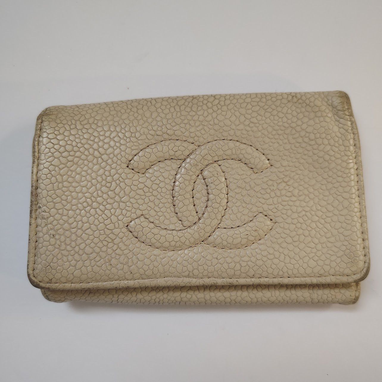 Chanel key pouch in beige caviar leather