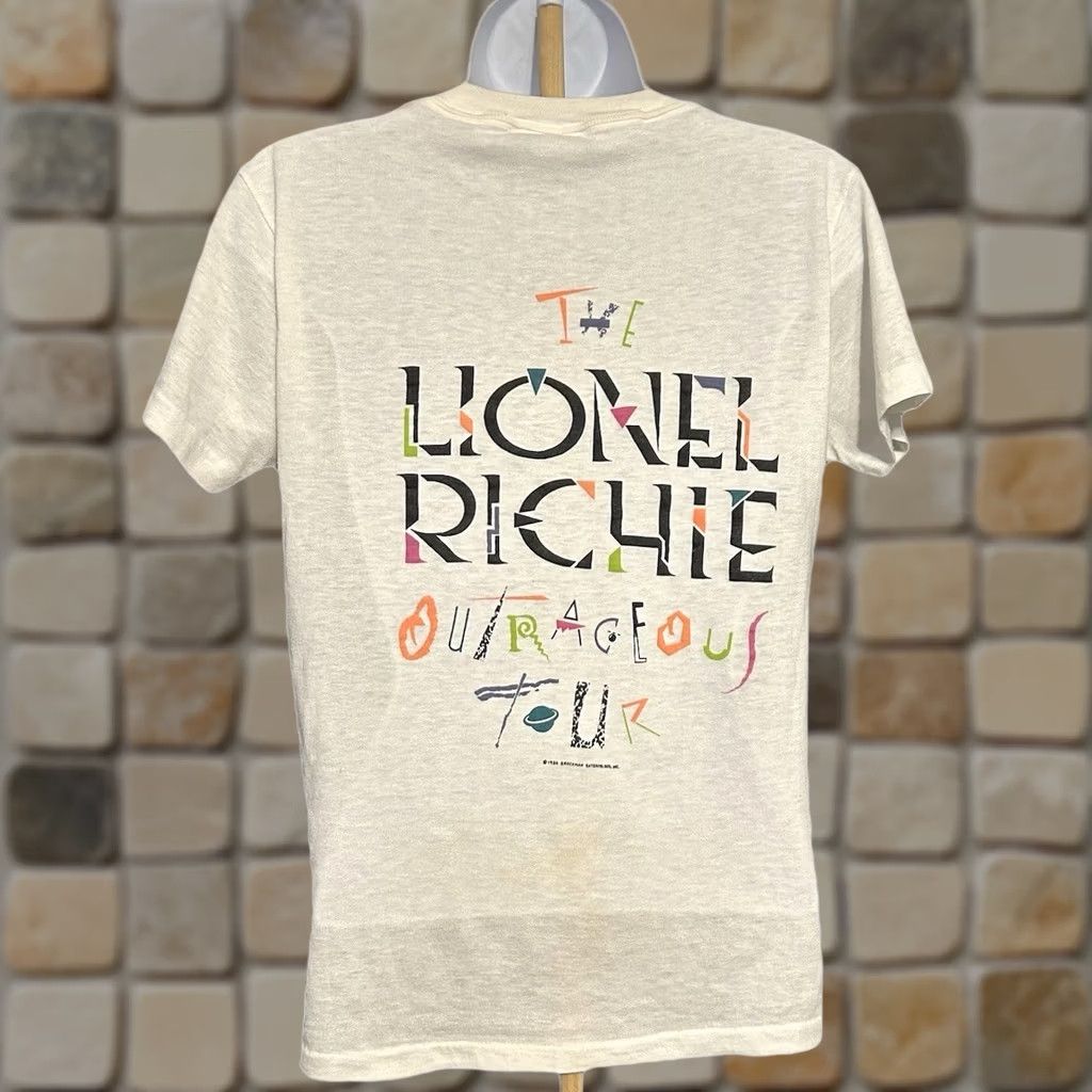 Vintage 1. If the item is vintage, start with "VINTAGE Size S / US 4 / IT 40 - 1 Thumbnail