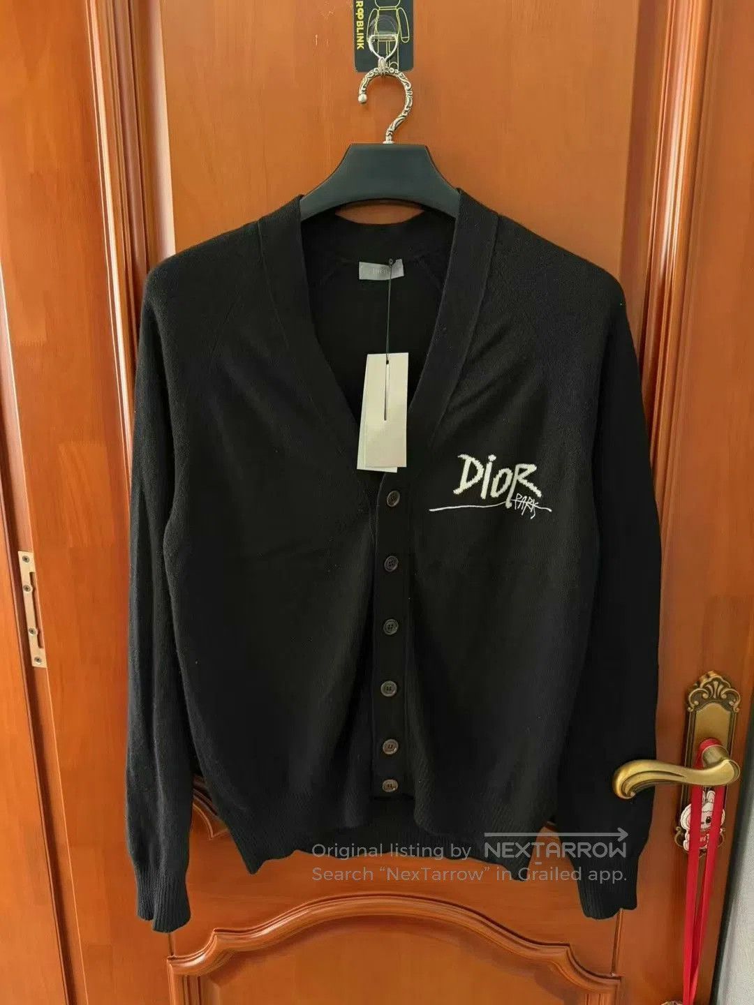black logo cashmere cardigan by Dior.