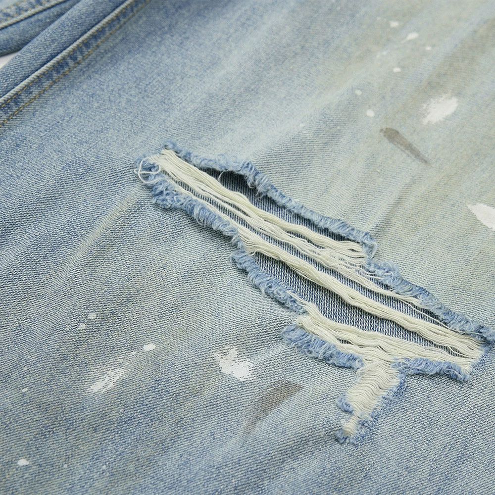 Men's street punk loose straight ink-splashed ripped jeans