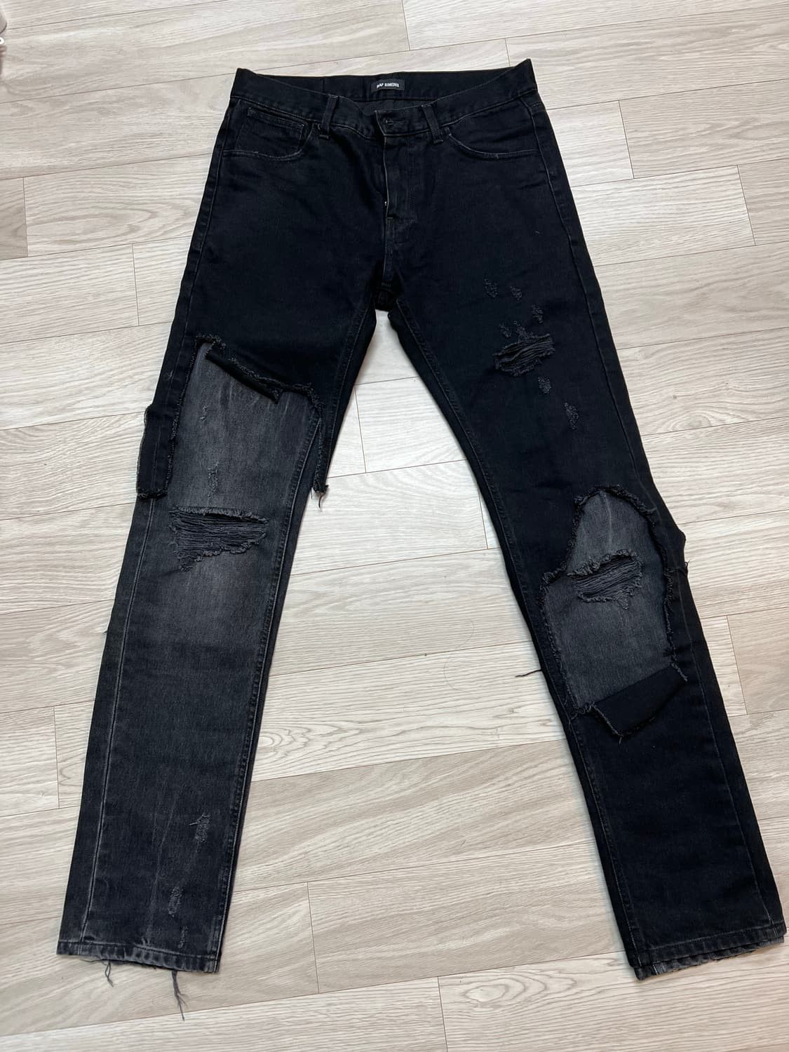 image of Raf Simons Double Layered Destroyed Jeans in Black, Men's (Size 31)