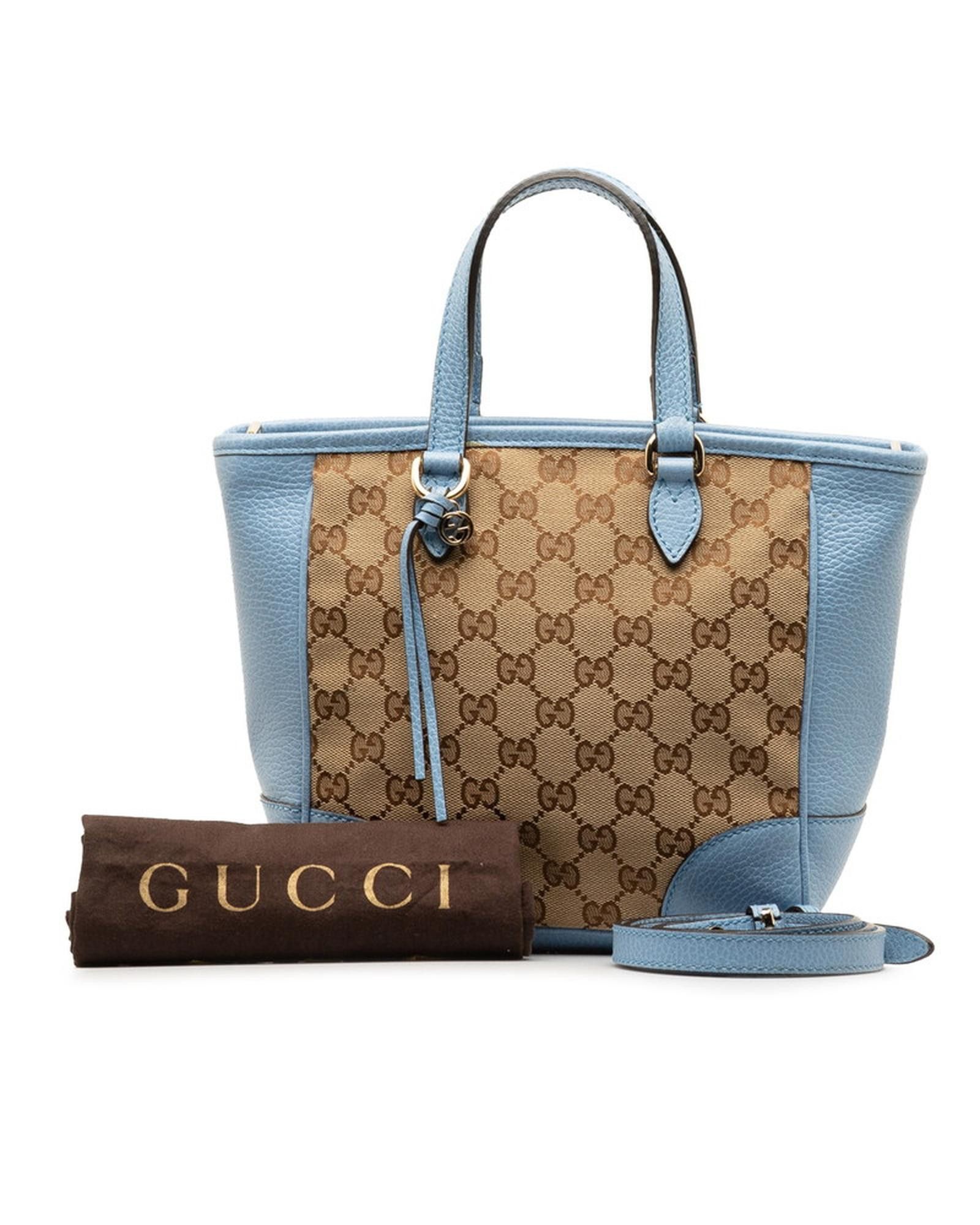 image of Gucci Canvas And Leather Handbag With Iconic GG Print in Blue, Women's