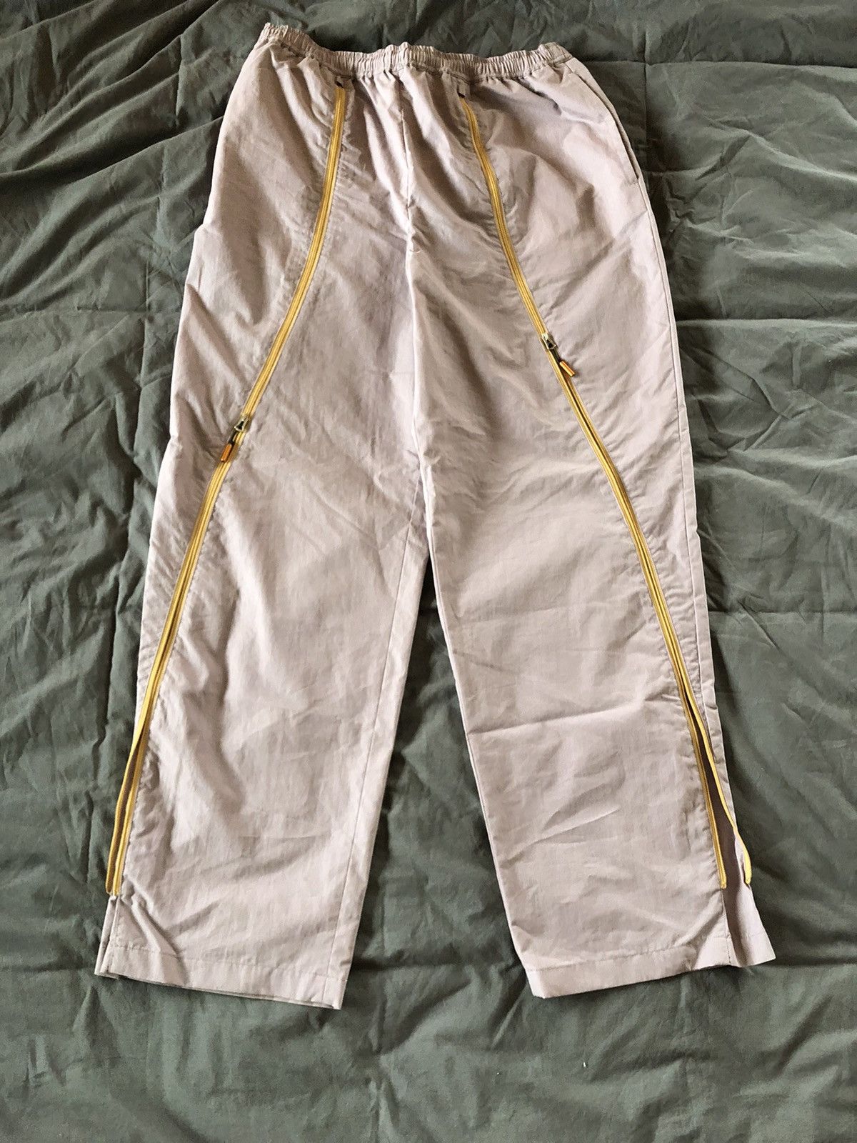 image of Acne Studios Baggy Loose Zipper Trousers in Pink, Men's (Size 32)