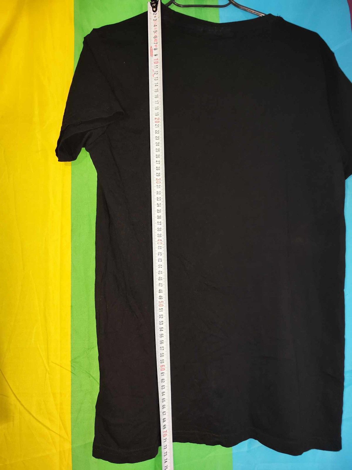 Designer × Other The Grinch men’s graphic black T-shirt size S Size US S / EU 44-46 / 1 - 7 Thumbnail