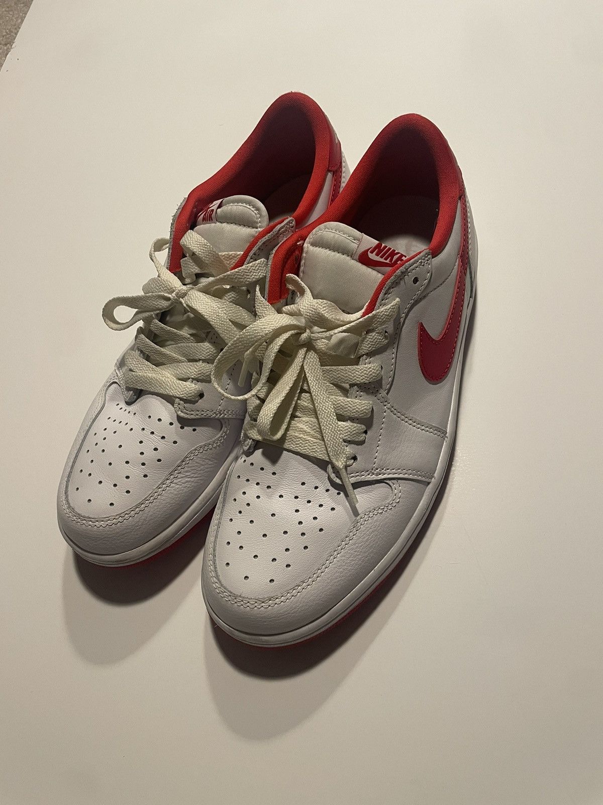 Air Jordan 1 low top red + white cream laces gently used