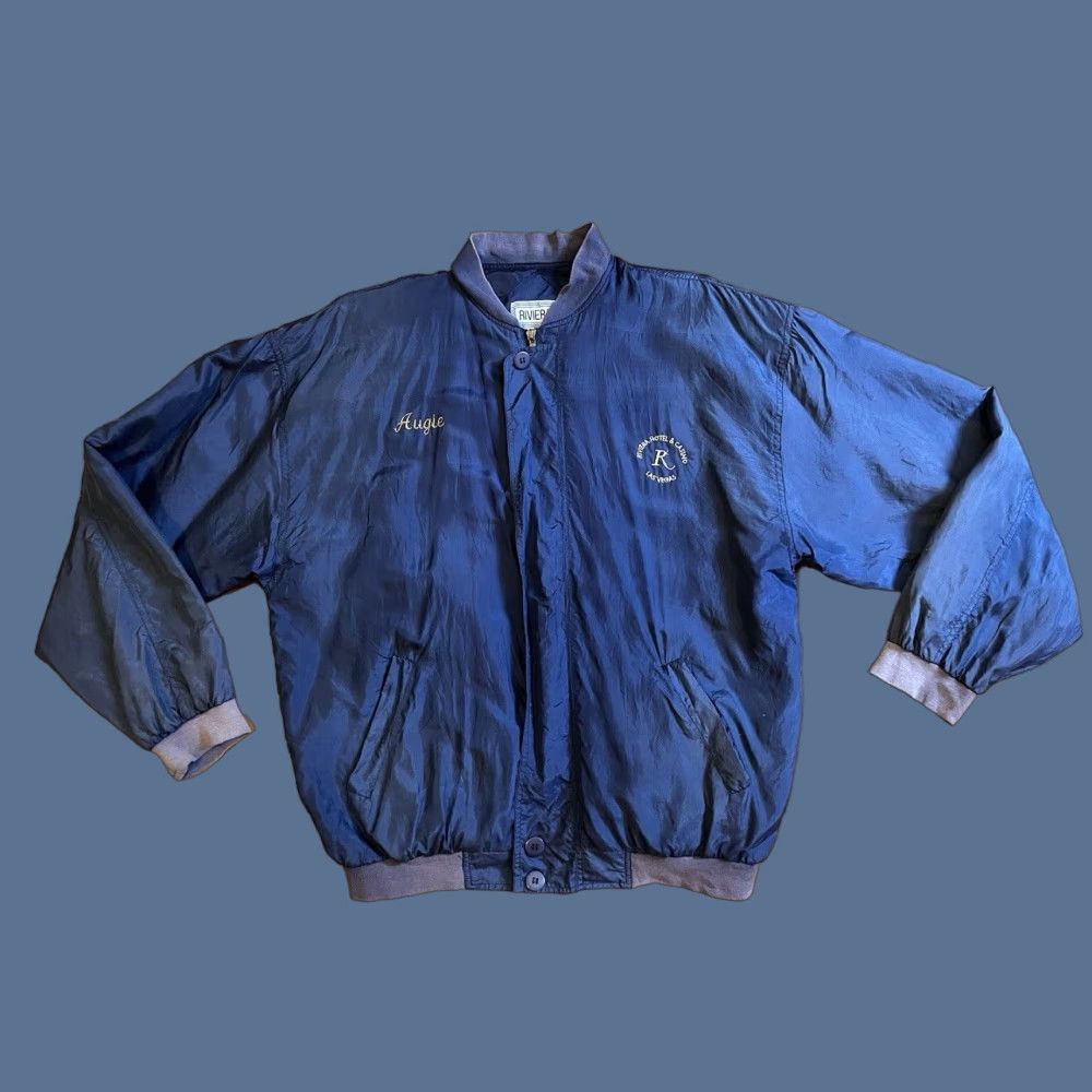 Rivieras VINTAGE Riviera Hotel & Casino Silk Jacket Men’s Large Blue Bomber Jacket Short Chest 48 in Embroidered AUGIE Mens 80s City Retro Money Size US L / EU 52-54 / 3 - 1 Thumbnail