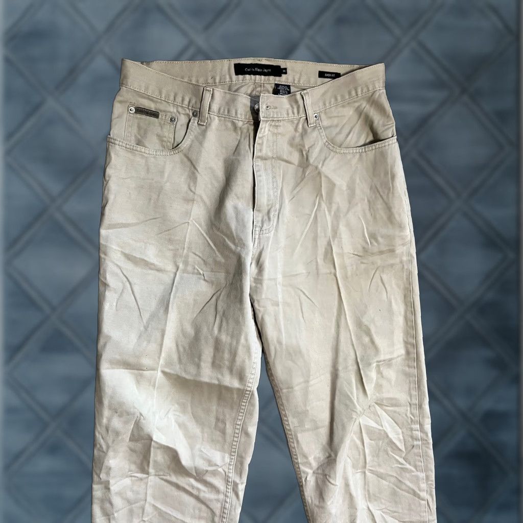 Calvin Klein VINTAGE Calvin Klein Jeans High Waisted Beige Easy Fit Pants 34x29 Men Jeans Regular 34 Beige Logo Retro Size US 34 / EU 50 - 1 Thumbnail