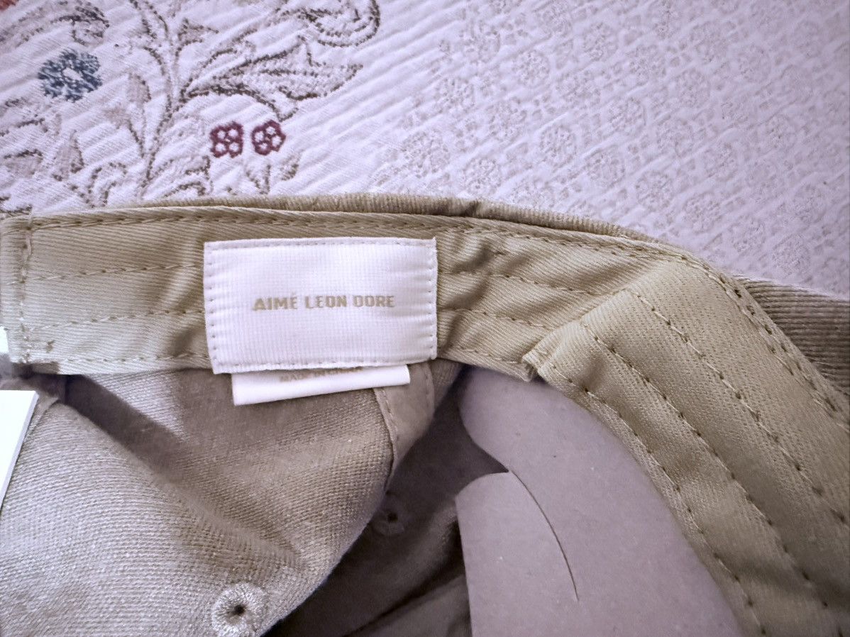 Aime Leon Dore Aime Leon Dore Cycling Logo Hat in “Safari” Cap Tan/Navy Size ONE SIZE - 5 Thumbnail