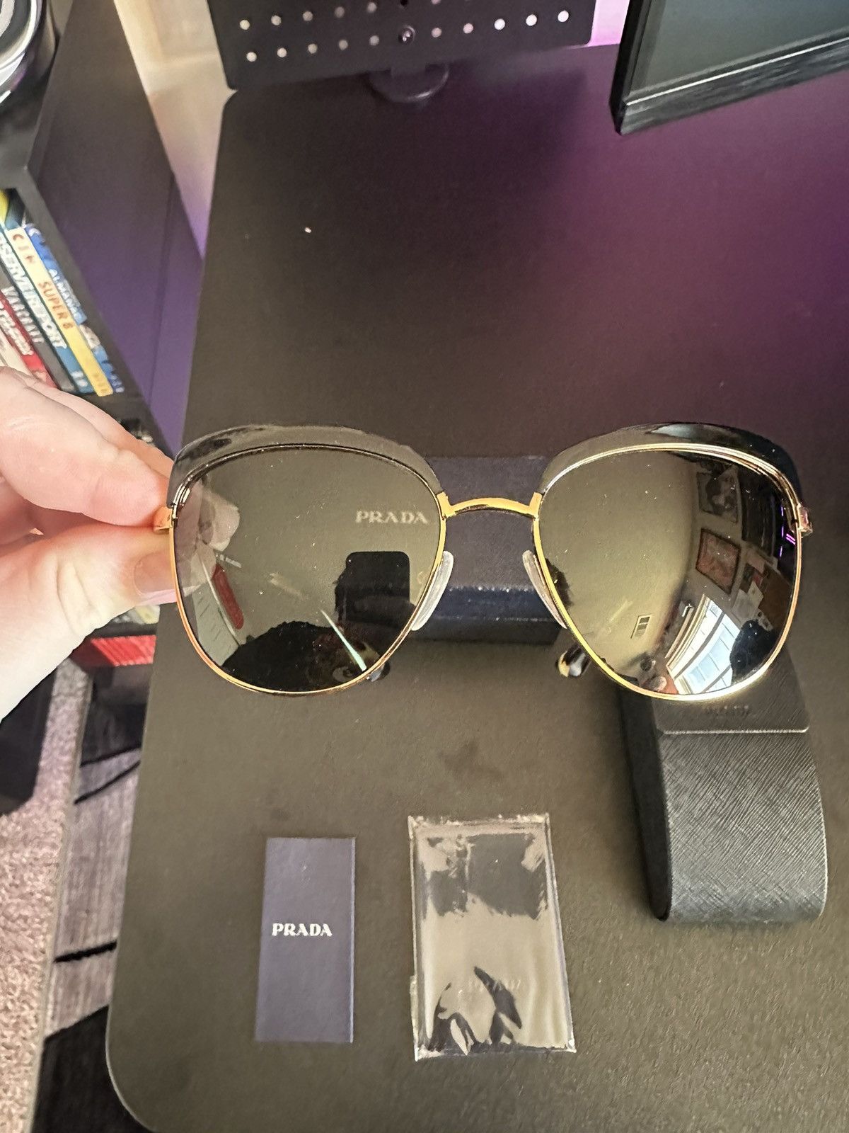 image of Prada Sunglasses in Black/Gold, Women's