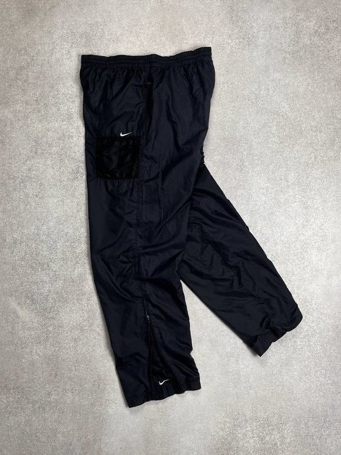 Vintage VINTAGE NIKE SWOOSH BAGGY NYLON TRACK PANTS Y2K L Size US 34 / EU 50 - 1 Thumbnail
