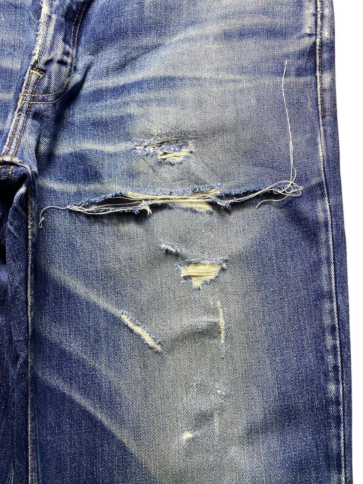 Vintage Levis 502 Blue Wash Ripped Straight Jeans