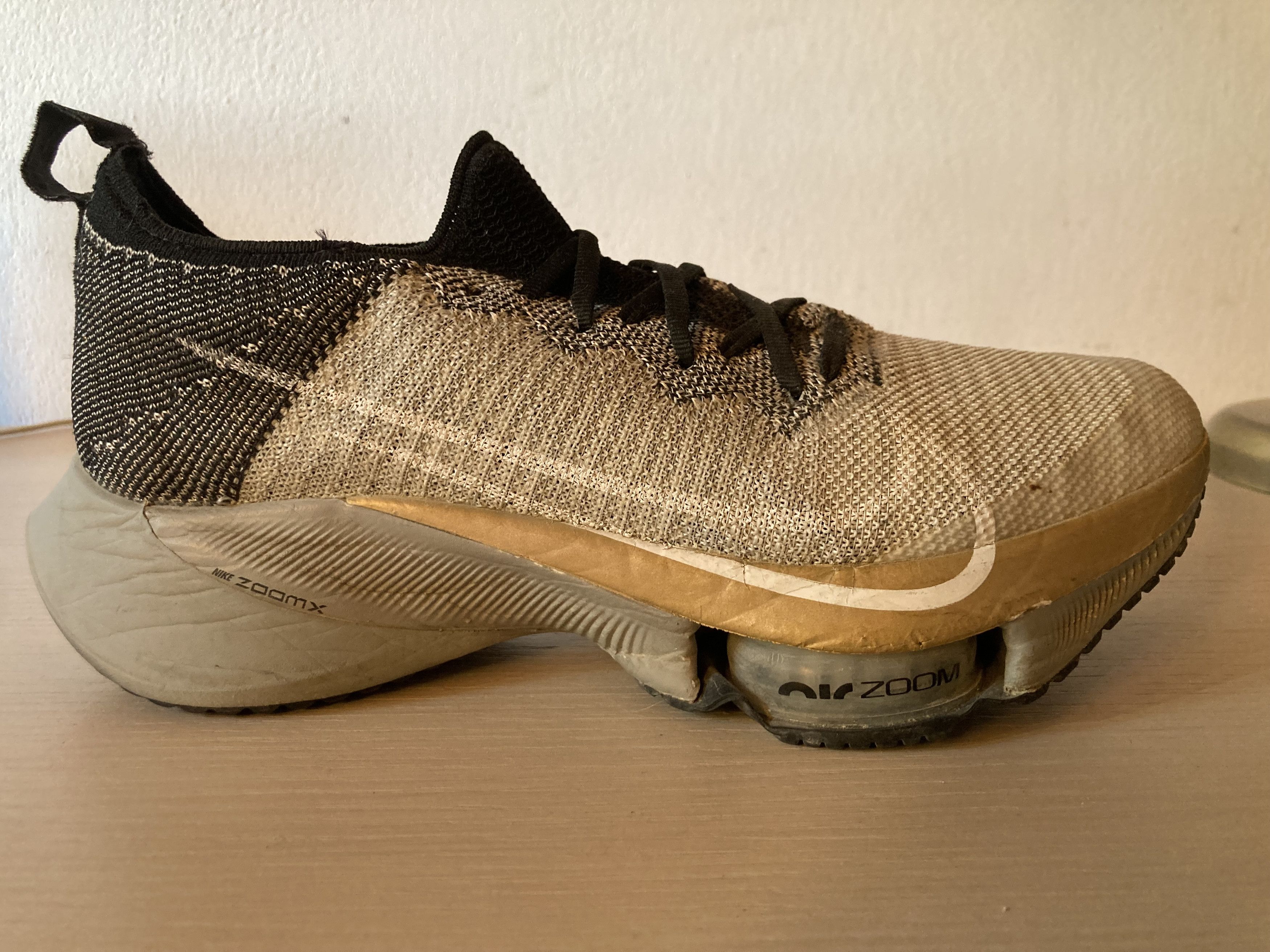 Nike Nike Air Zoom Tempo Next% Running shoes size 42 grey/gold Size US 9 / EU 42 - 1 Thumbnail
