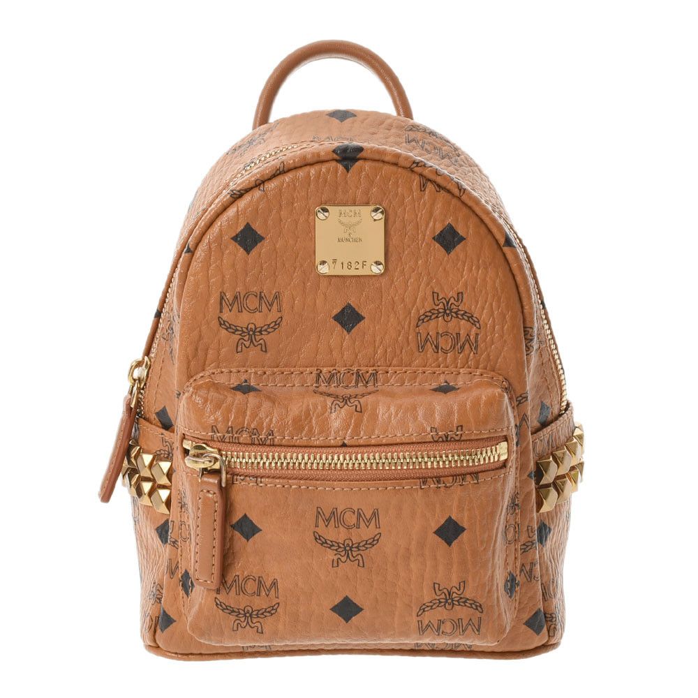image of MCM Backpack Mini Studs Leather Daypack Cognac in Black, Women's