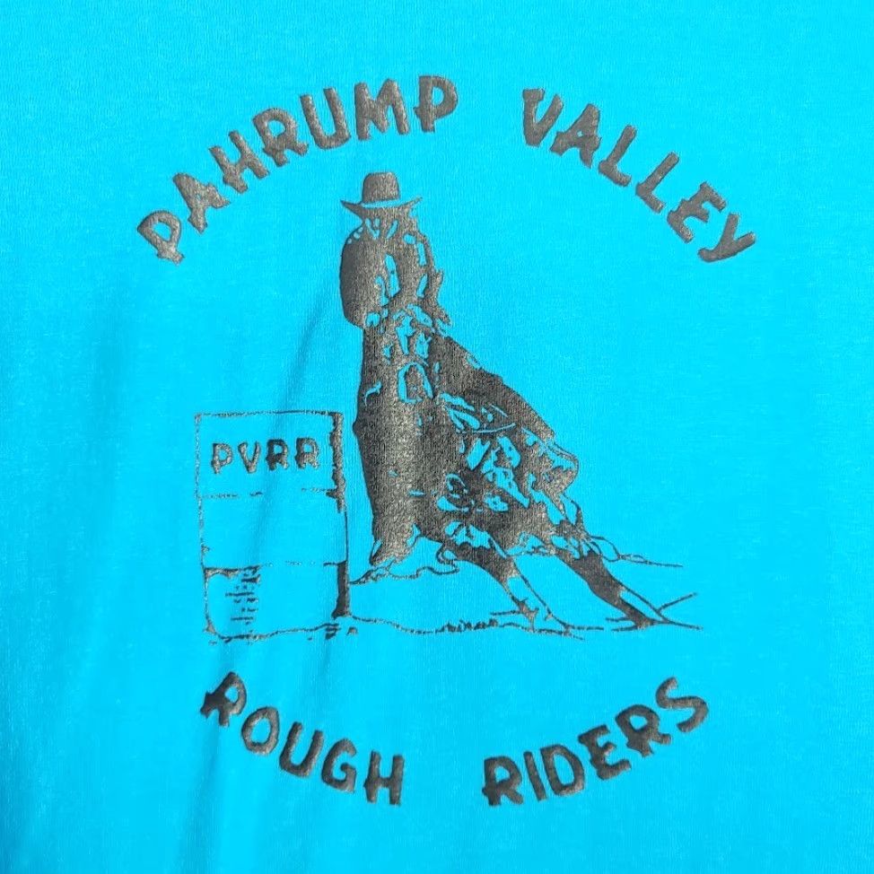 Vintage VINTAGE Pahrump Valley Rough Riders T Shirt Mens XL 80s Rodeo Cowboy Western Blue Cotton Blend 1980s Bull Riding Bull Rider T-Shirt Size US XL / EU 56 / 4 - 5 Thumbnail