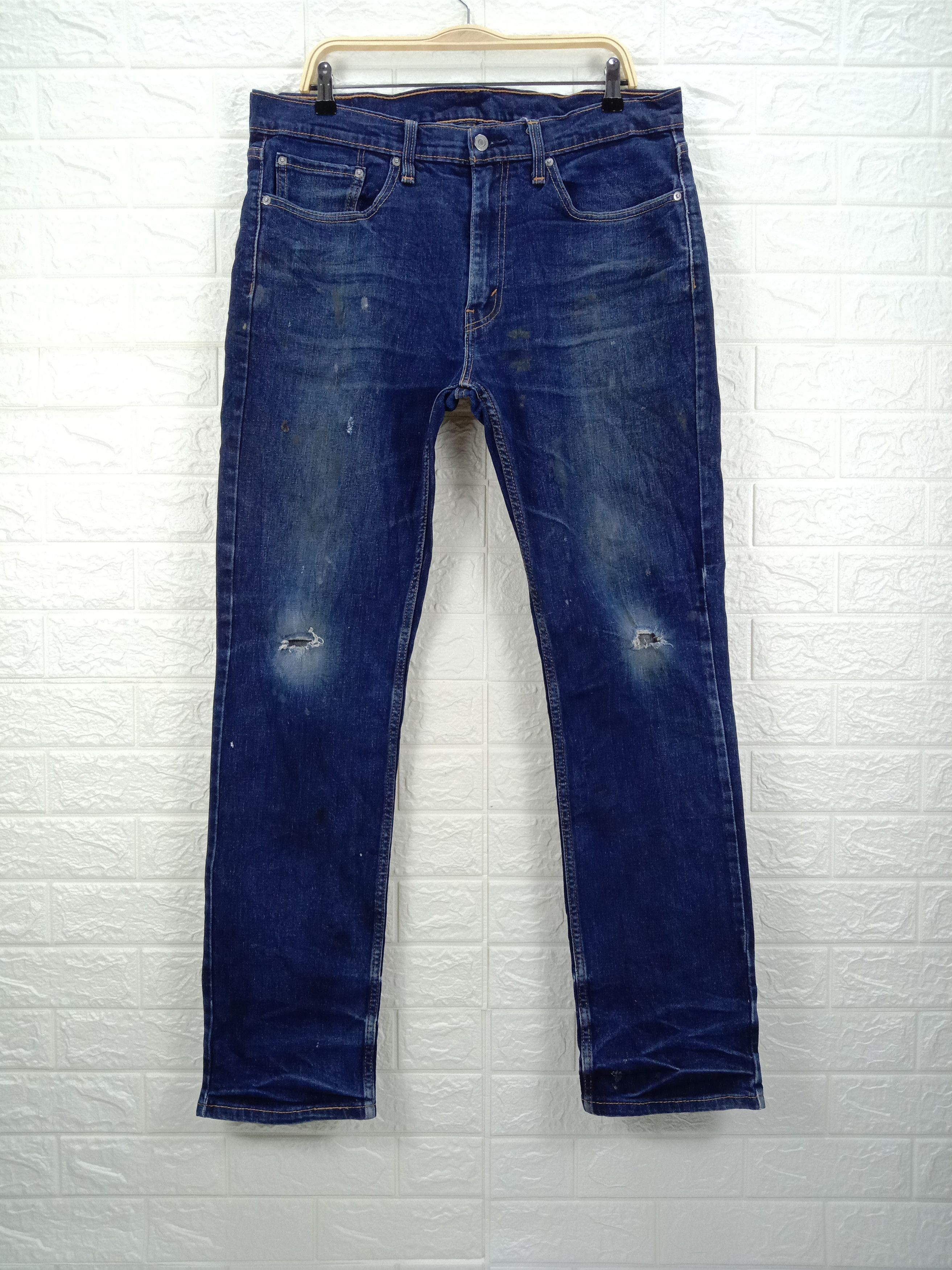 image of Vintage Levi's 514 Jeans Slim Straight Distressed Denim in Blue, Men's (Size 36)