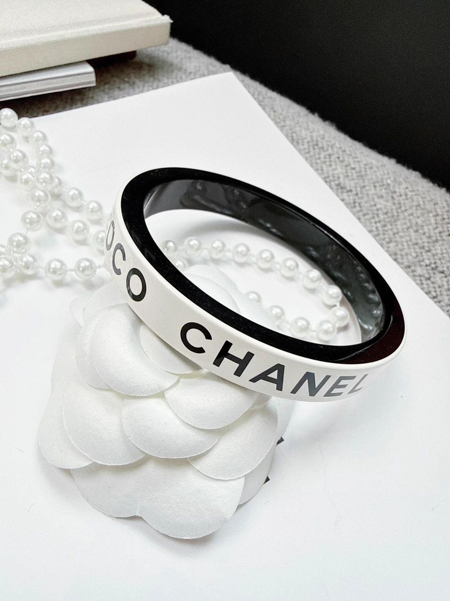 Chanel Chanel 22S White Black AcrylicLetter Brace 99N Size ONE SIZE - 1 Thumbnail