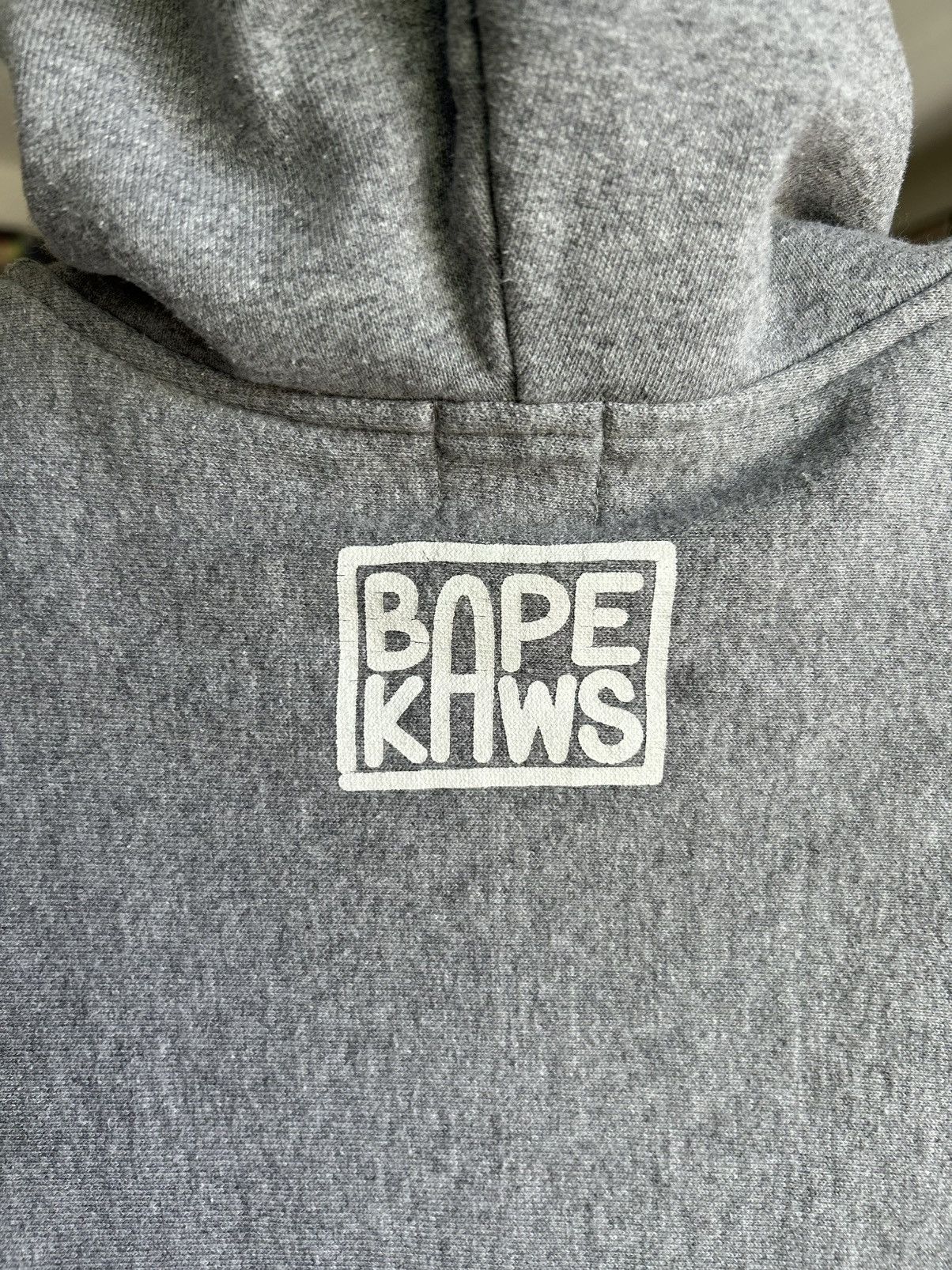 Bape × Kaws BAPE KAWS SMOKE CLOUD PLANE HOODIE Size US S / EU 44-46 / 1 - 6 Thumbnail