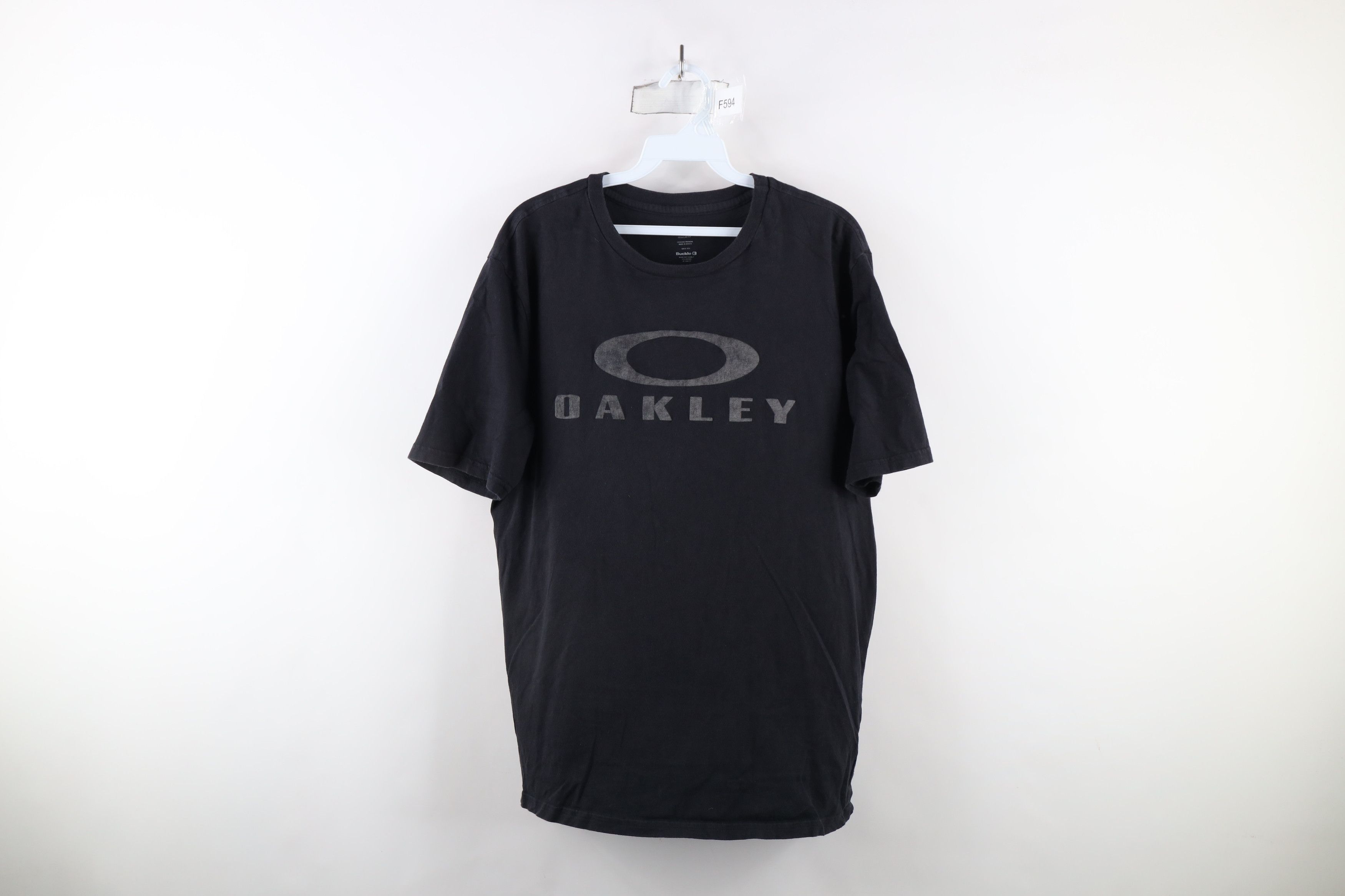 Oakley × Vintage Vintage Oakley Spell Out Big Logo Short Sleeve T-Shirt Black Size US XL / EU 56 / 4 - 1 Thumbnail