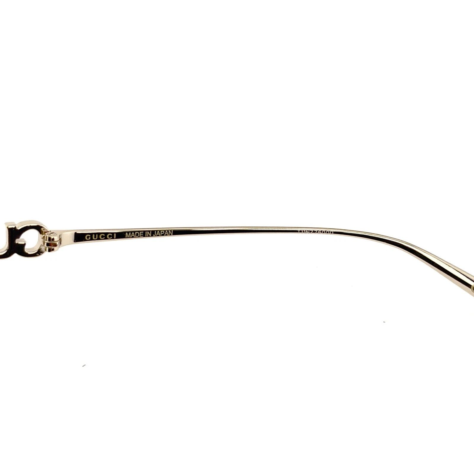 Gucci GUCCI 1936 Gg1936S Gold Black Logo Wrap Sunglasses 001 Size ONE SIZE - 3 Thumbnail