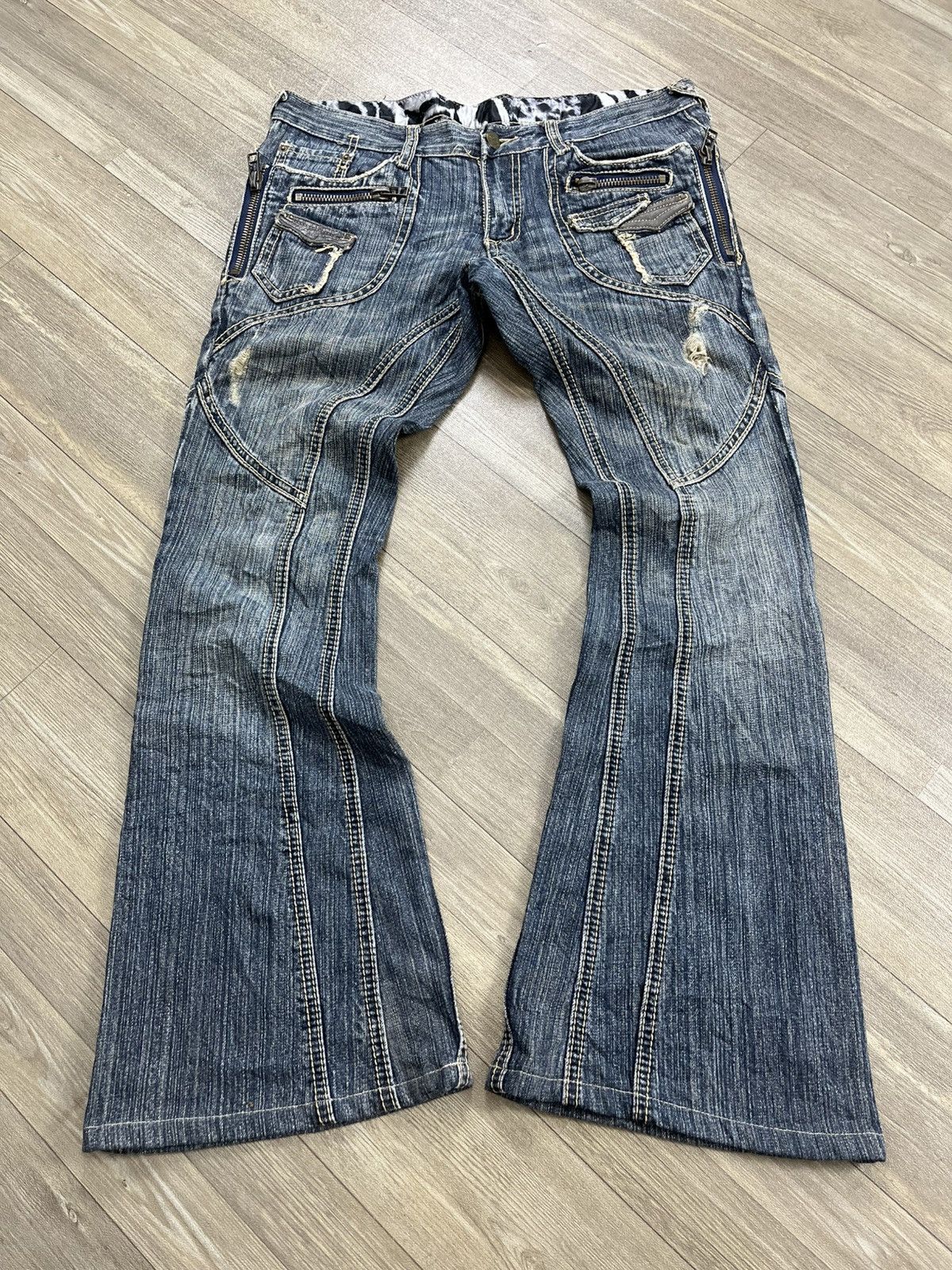 Tornado Mart 2000s Tornado Mart Tribal Flared Jeans | Grailed
