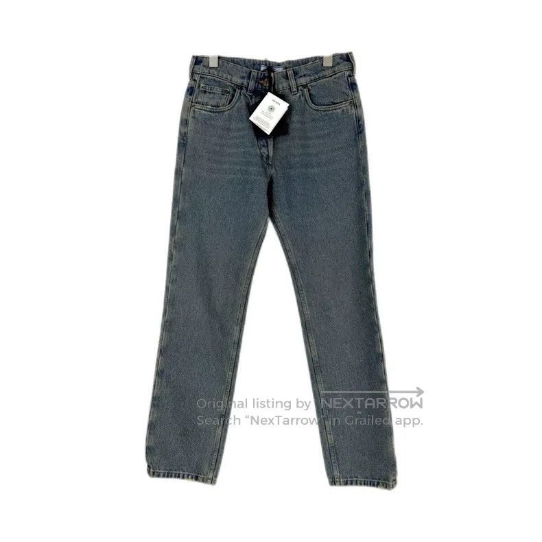 Prada Blue washed and destroyed triangle logo jeans