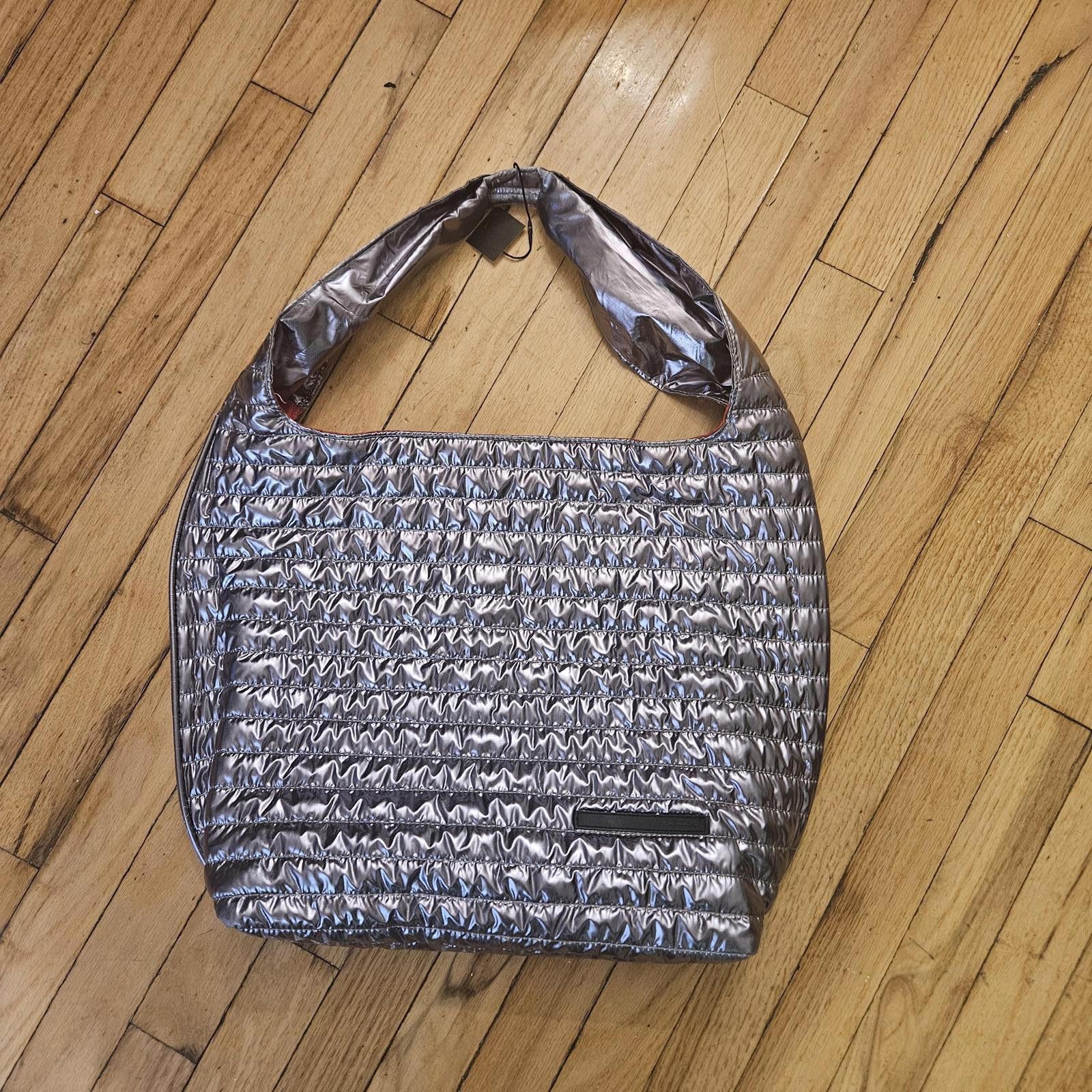 Designer Tahari Metallic Silver Handbag with Vibrant Red Interior Size ONE SIZE - 1 Thumbnail