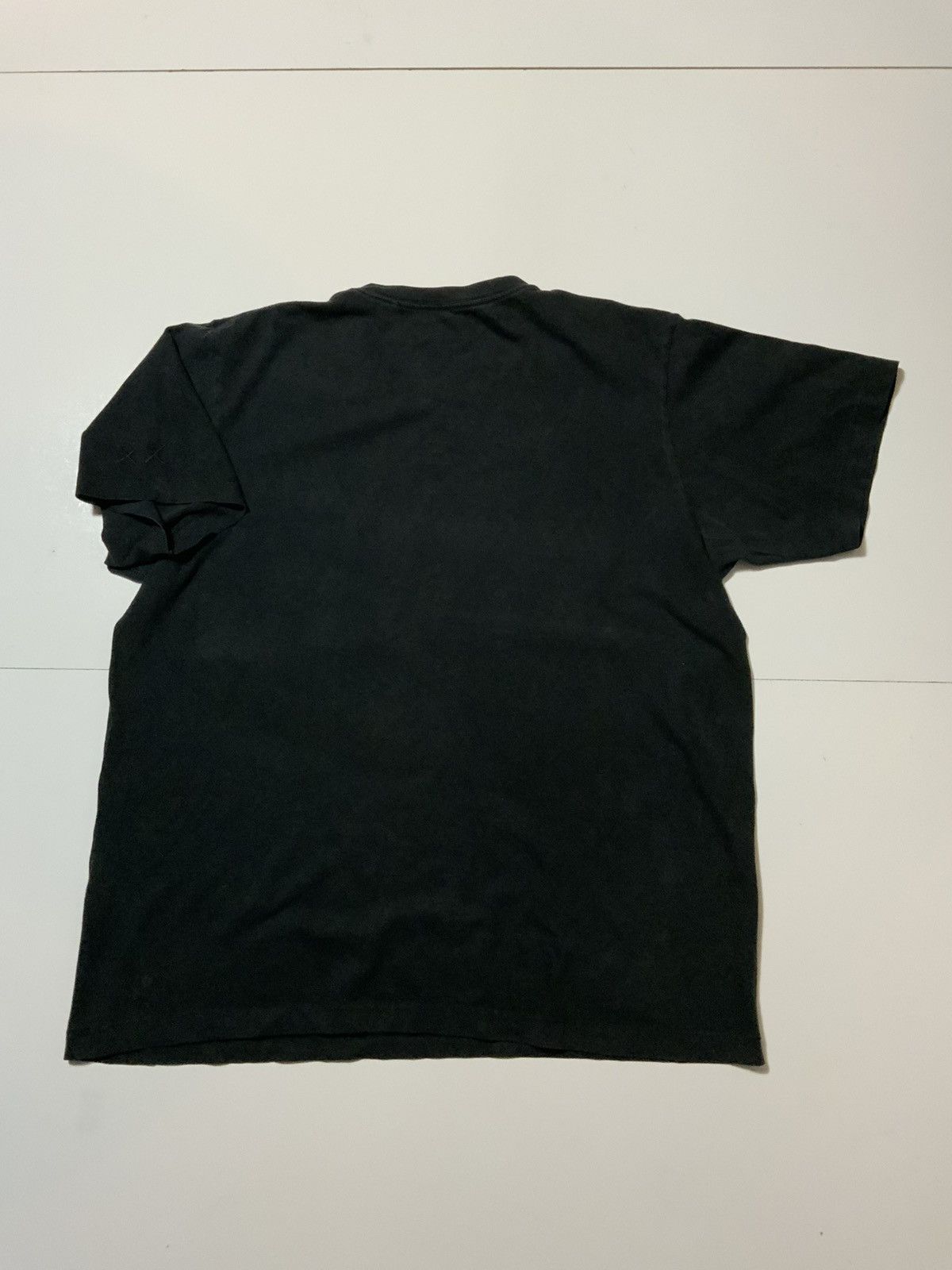 Kaws × Peanuts × Uniqlo Uniqlo UT X Kaws X Peanuts Ghost Black Crewneck S/S T-Shirt Size US L / EU 52-54 / 3 - 2 Thumbnail