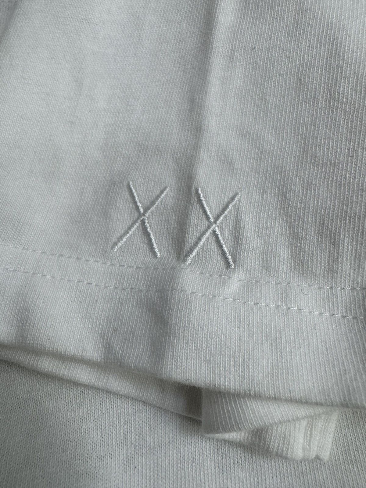 Original Fake KAWS + Original Fake Pink Accomplice shirt. Size US M / EU 48-50 / 2 - 7 Thumbnail