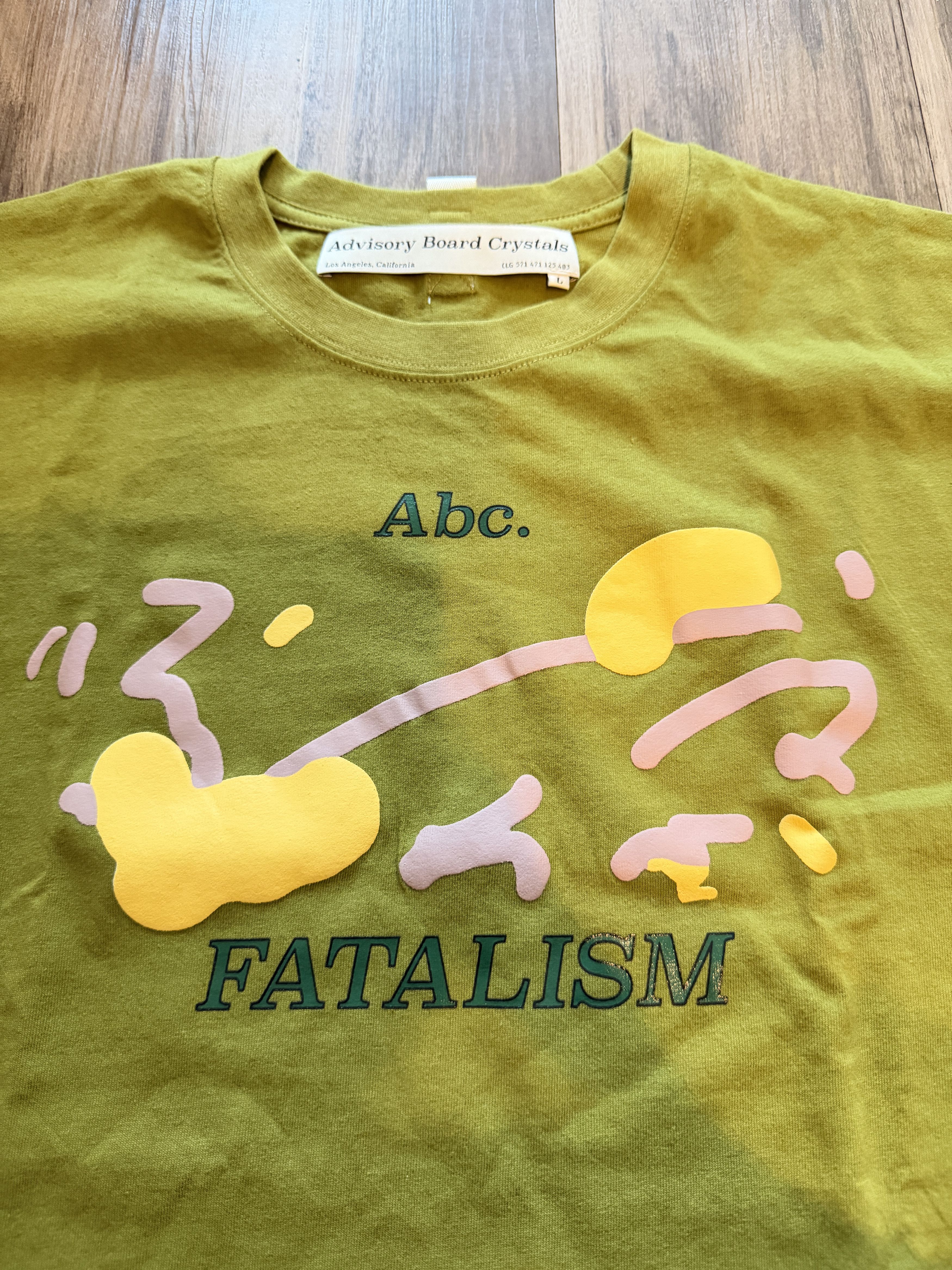 Advisory Board Crystals Isms Fatalism Tee