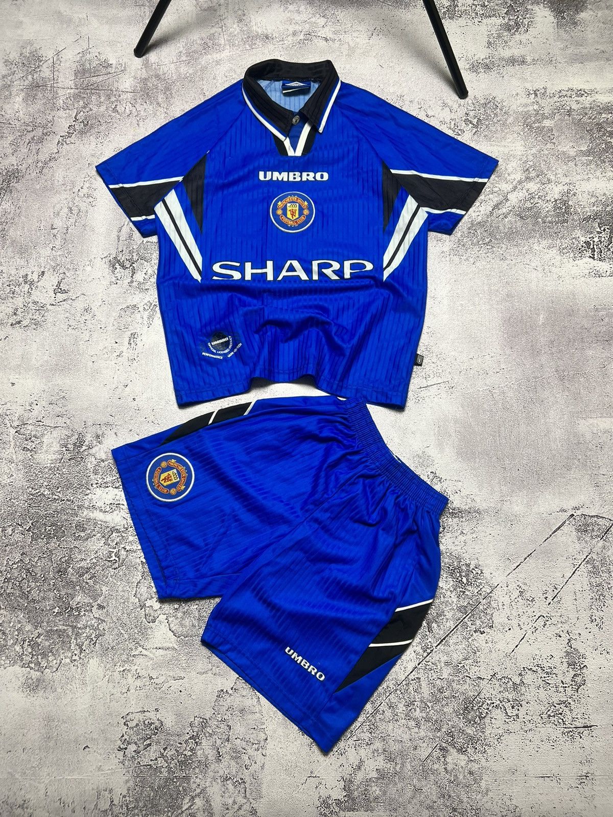 image of Soccer Jersey x Umbro Vintage 1996-98 Manchester United Jersey Umbro Sharp in Blue (Size Small)