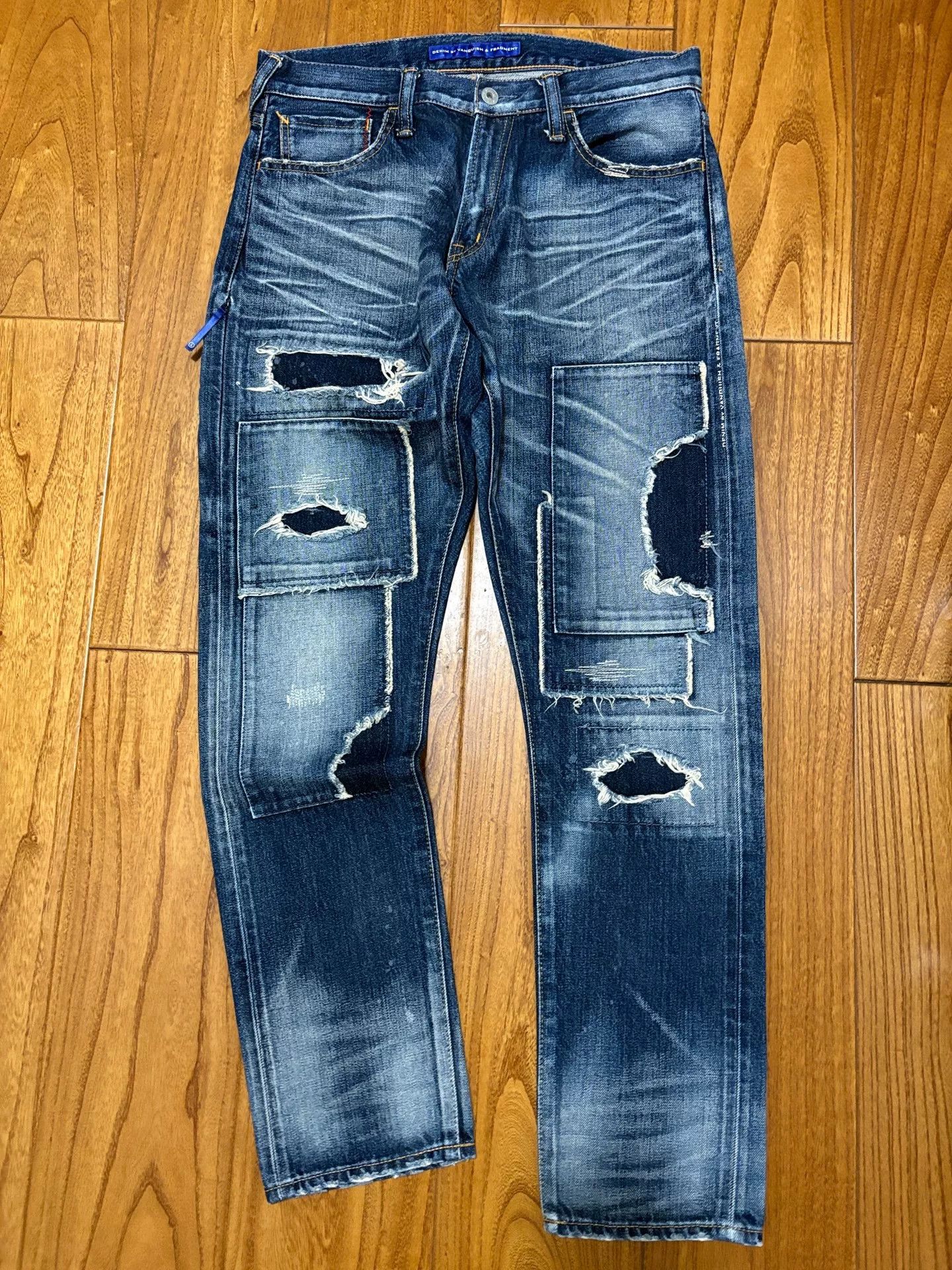 denim by vanquish & fragment distressed jeans
