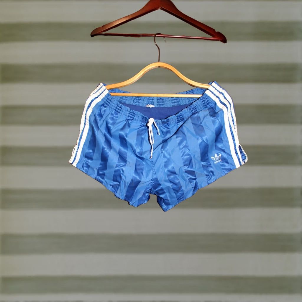Adidas VINTAGE Adidas blue with blue stripes Nylon Running shorts Shirt Mens M/L blue 80s Football? Size US 31 - 1 Thumbnail