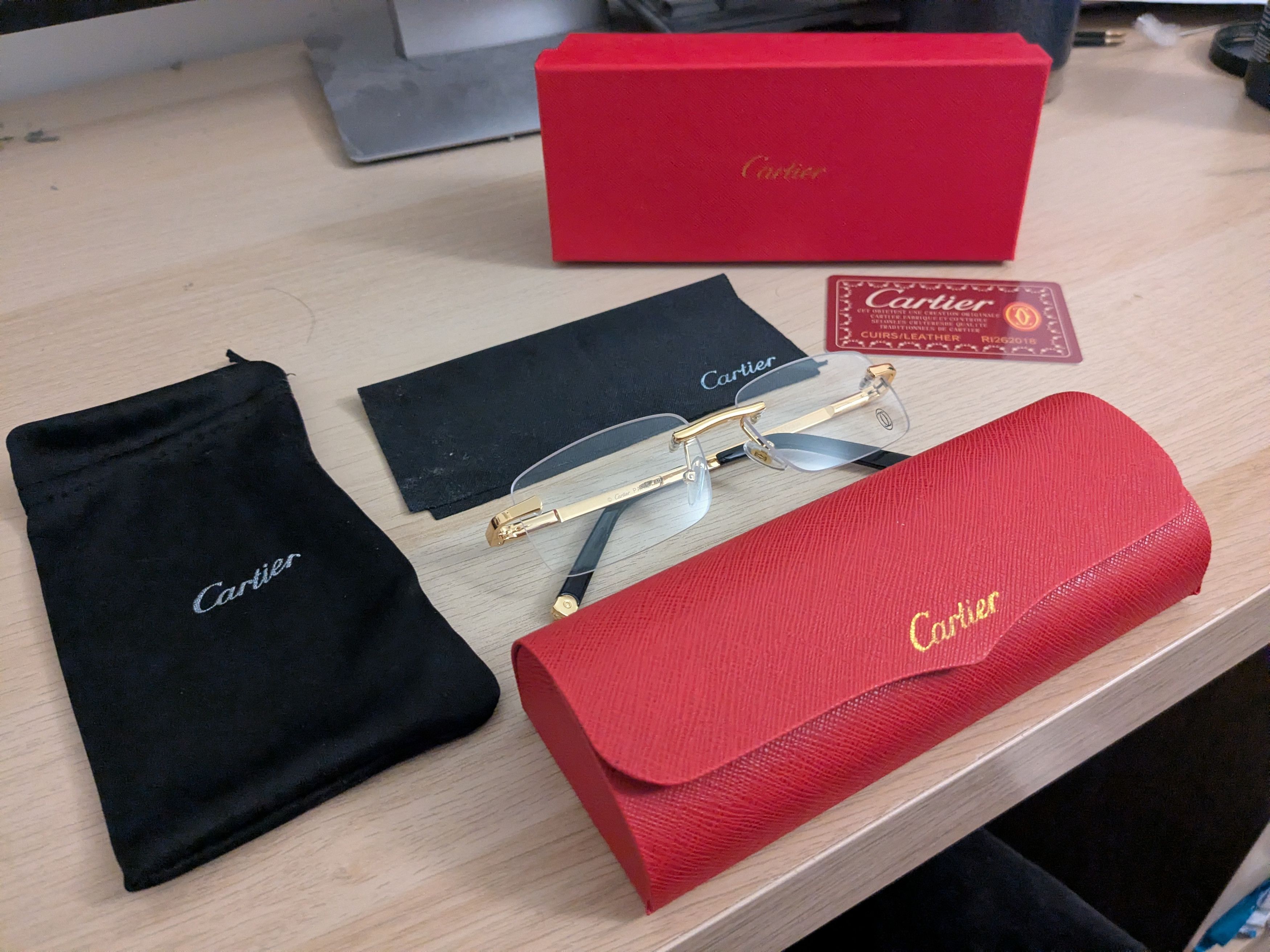 Cartier CT00550 black rimless sunglasses