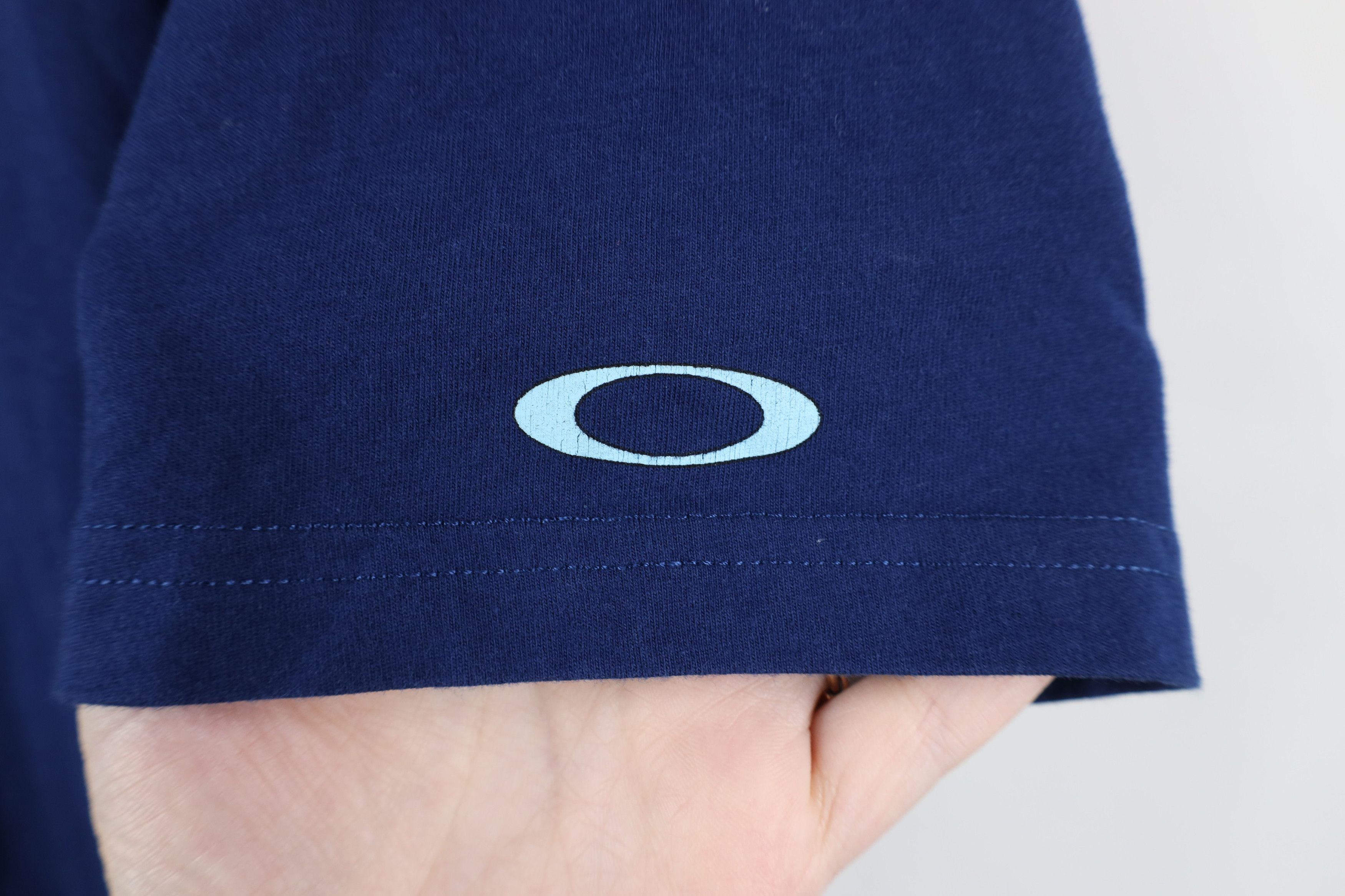 Oakley × Vintage Vintage Y2K Oakley Faded Spell Out Block Letter T-Shirt Blue Size US L / EU 52-54 / 3 - 4 Thumbnail