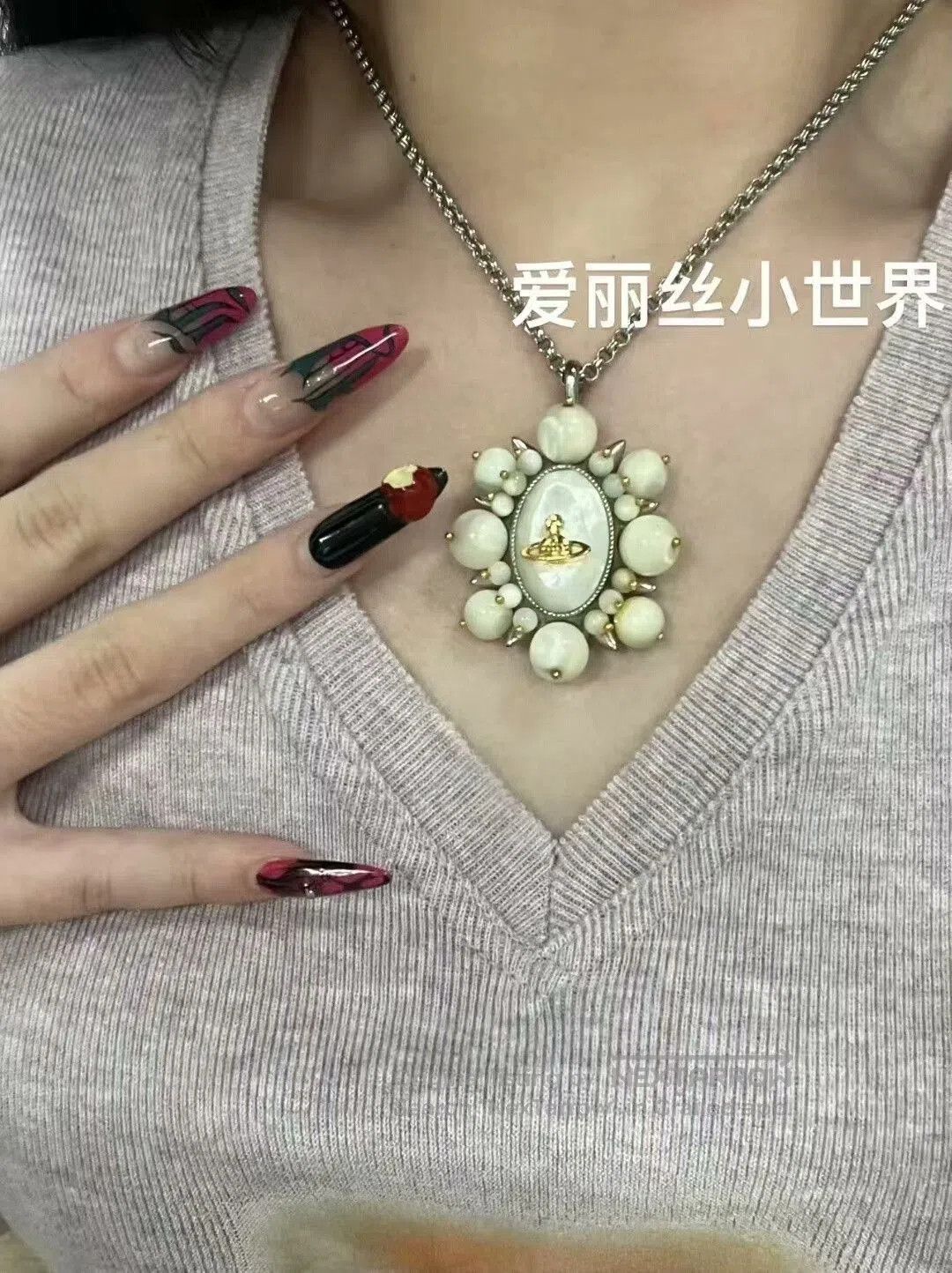vivienne westwood saturn necklace.
