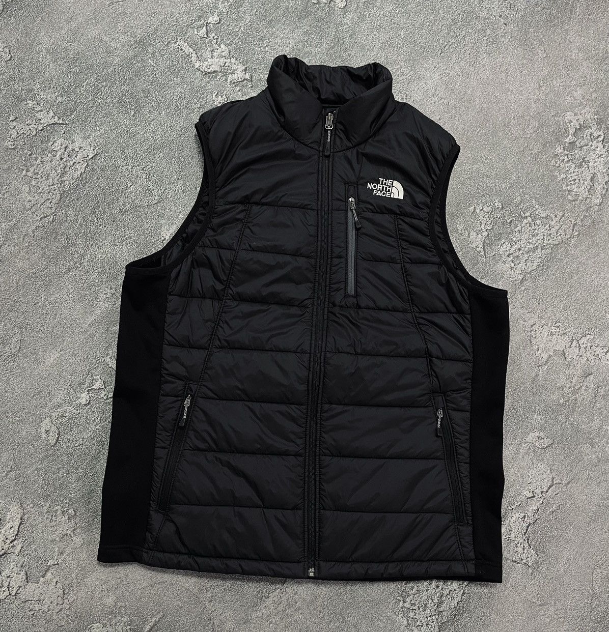 North face vest sizing best sale