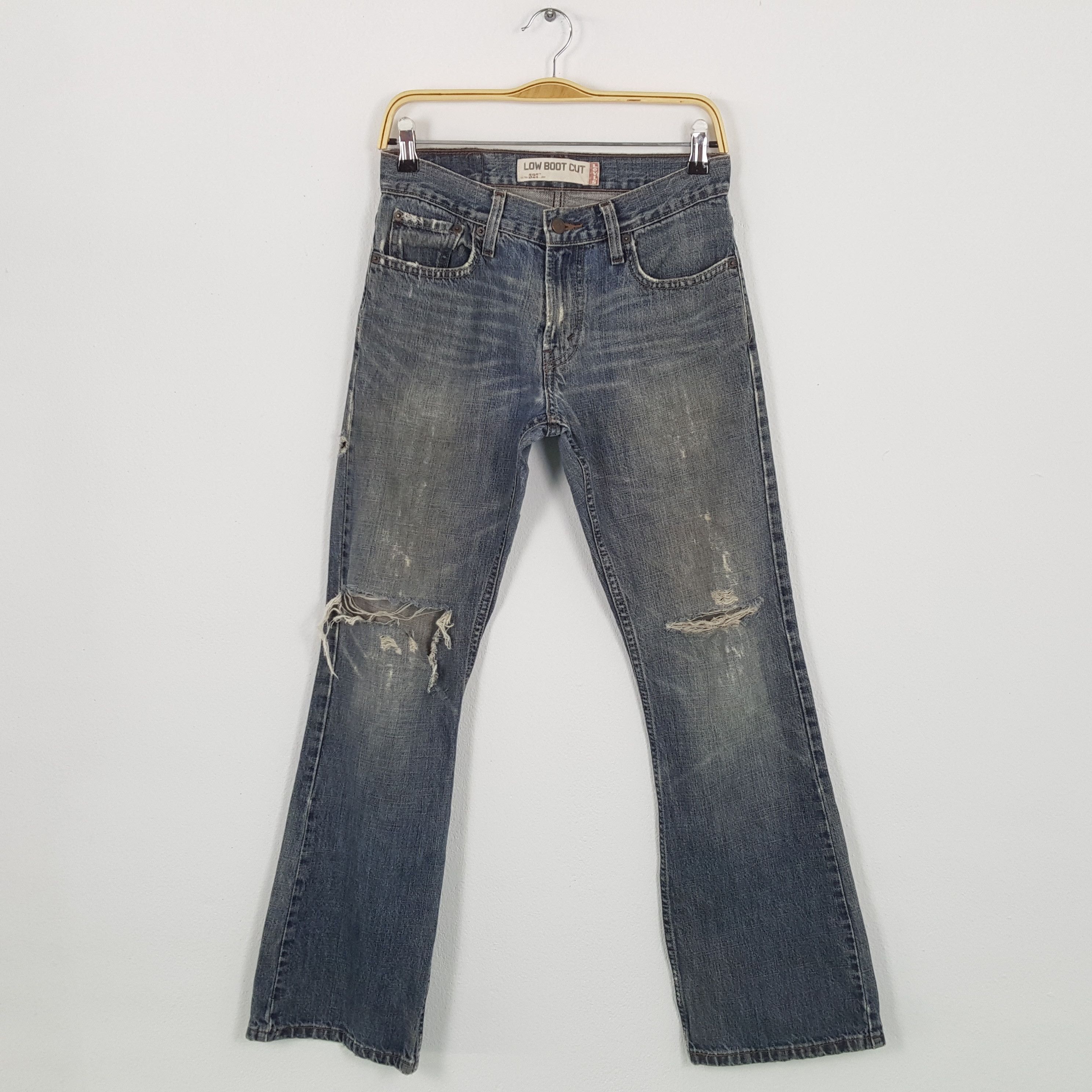 image of Vintage Levi's 50 Kurt Cobain Distressed Bootcut Jeans in Blue Jean, Men's (Size 28)