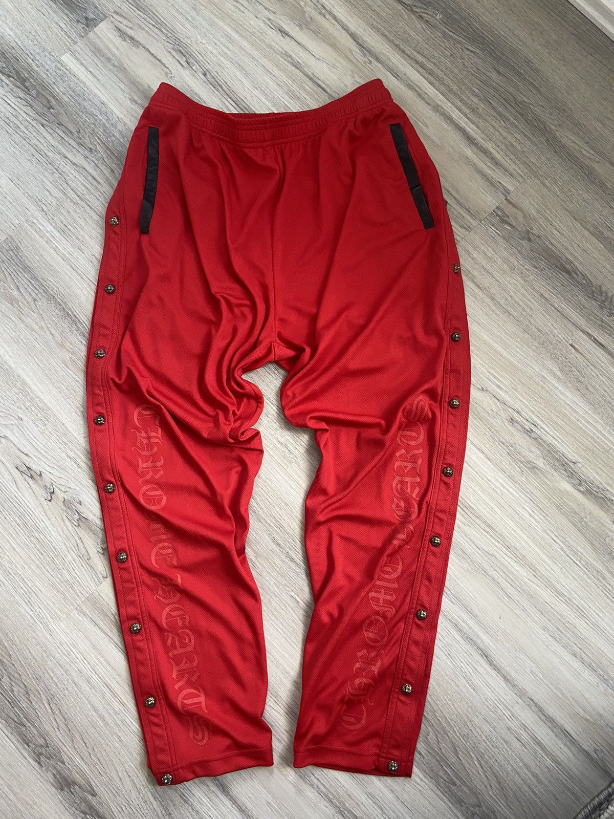 image of Chrome Hearts Mesh Snap Track Pants in Red, Men's (Size 36)