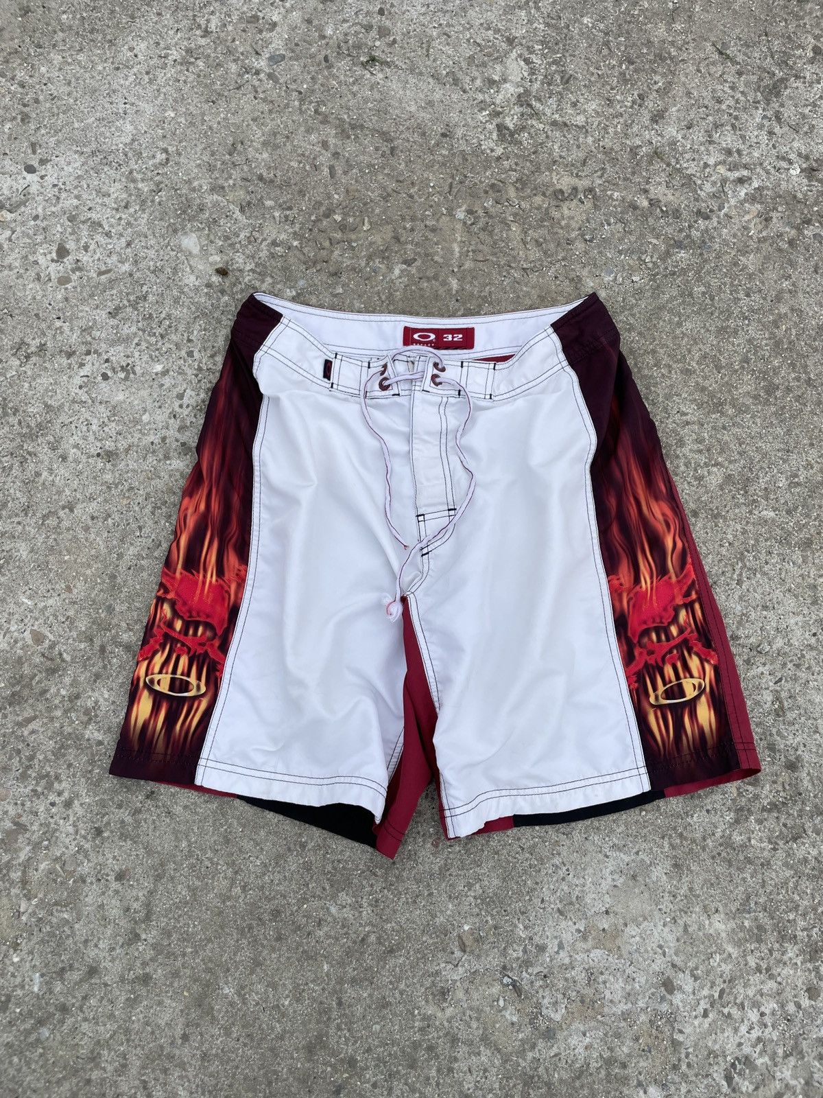 Oakley oakley skull flames board shorts 2000s vintage | Grailed