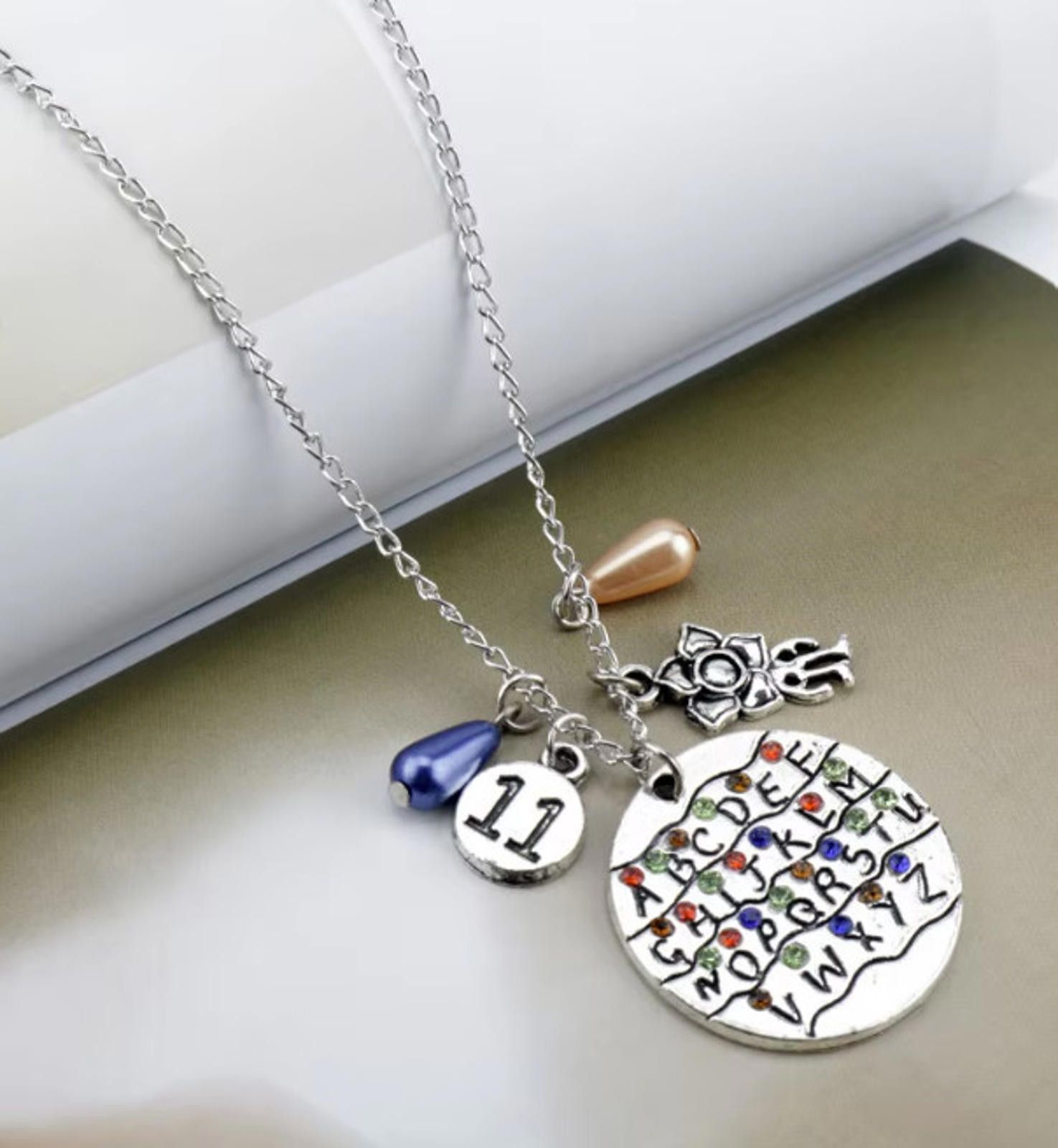 The Unbranded Brand STRANGER THINGS Necklace Pendant Bulb Alphabet Demogorgon Size ONE SIZE - 2 Thumbnail