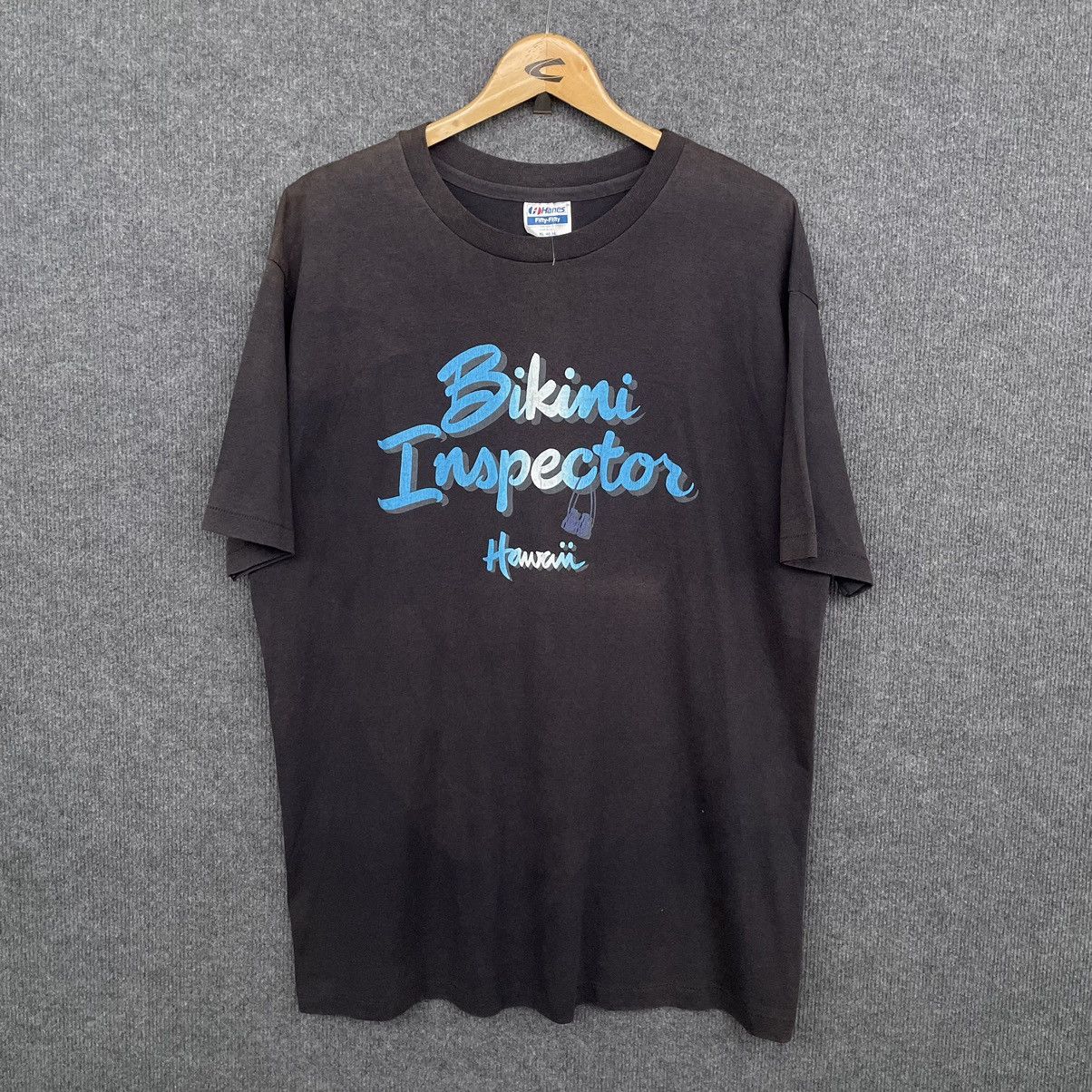 Vintage Vintage 1980s Hawaii Bikini Inspector Faded Black T Shirt Size US XL / EU 56 / 4 - 1 Thumbnail