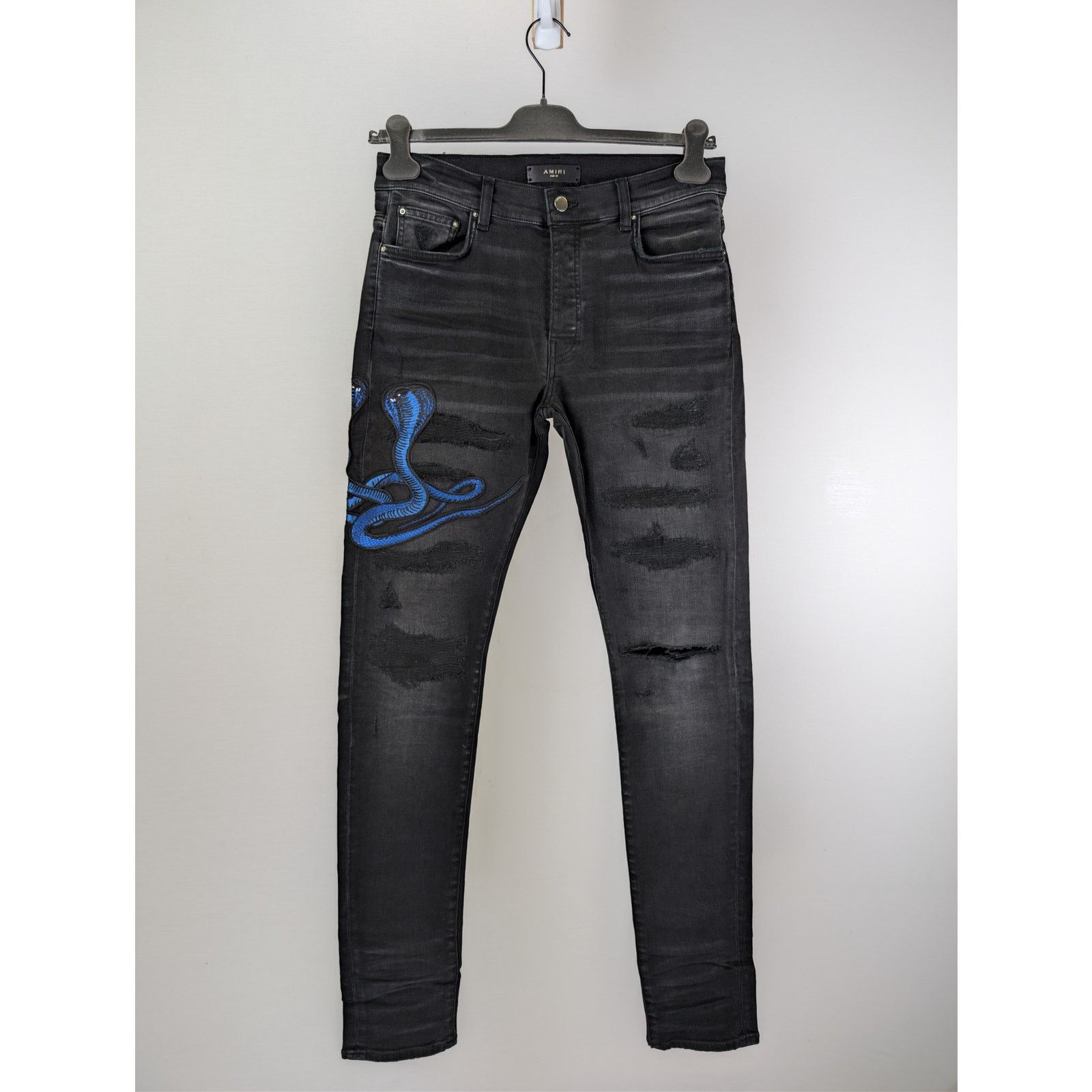 Amiri Amiri Cherub Print Jeans in Aged Black | Grailed